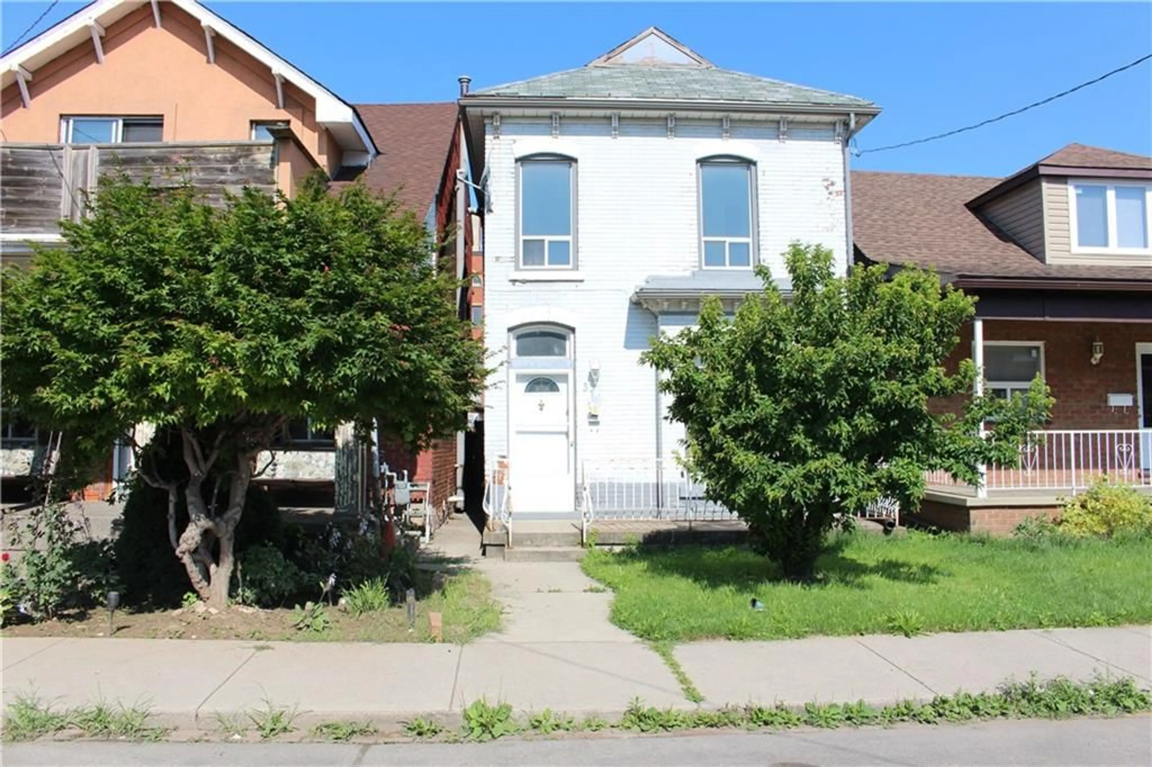 Frontside or backside of a home for 311 EAST Ave, Hamilton Ontario L8L 5J6