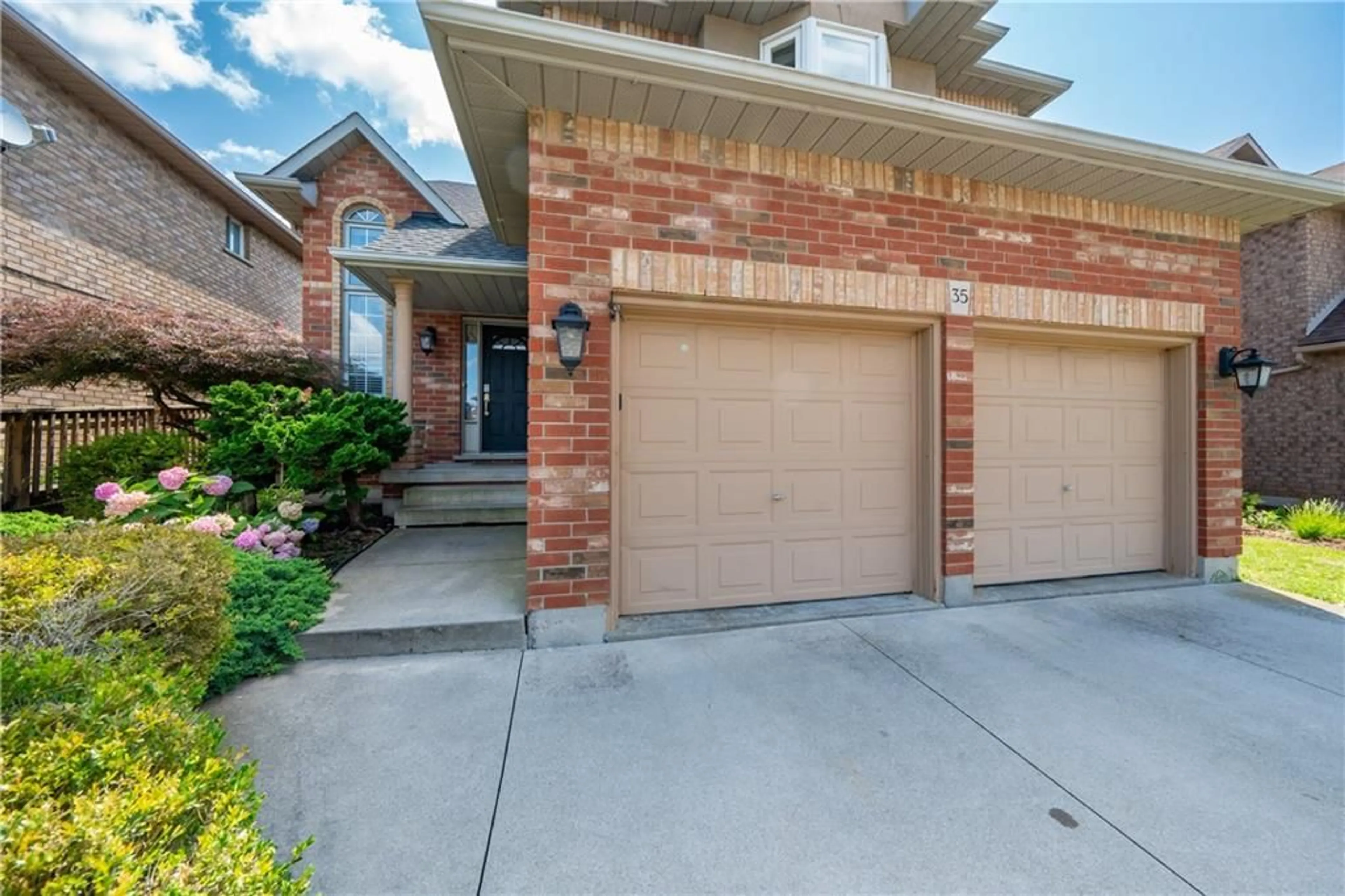 Home with brick exterior material for 35 SPADARA Dr, Hamilton Ontario L9B 2K3