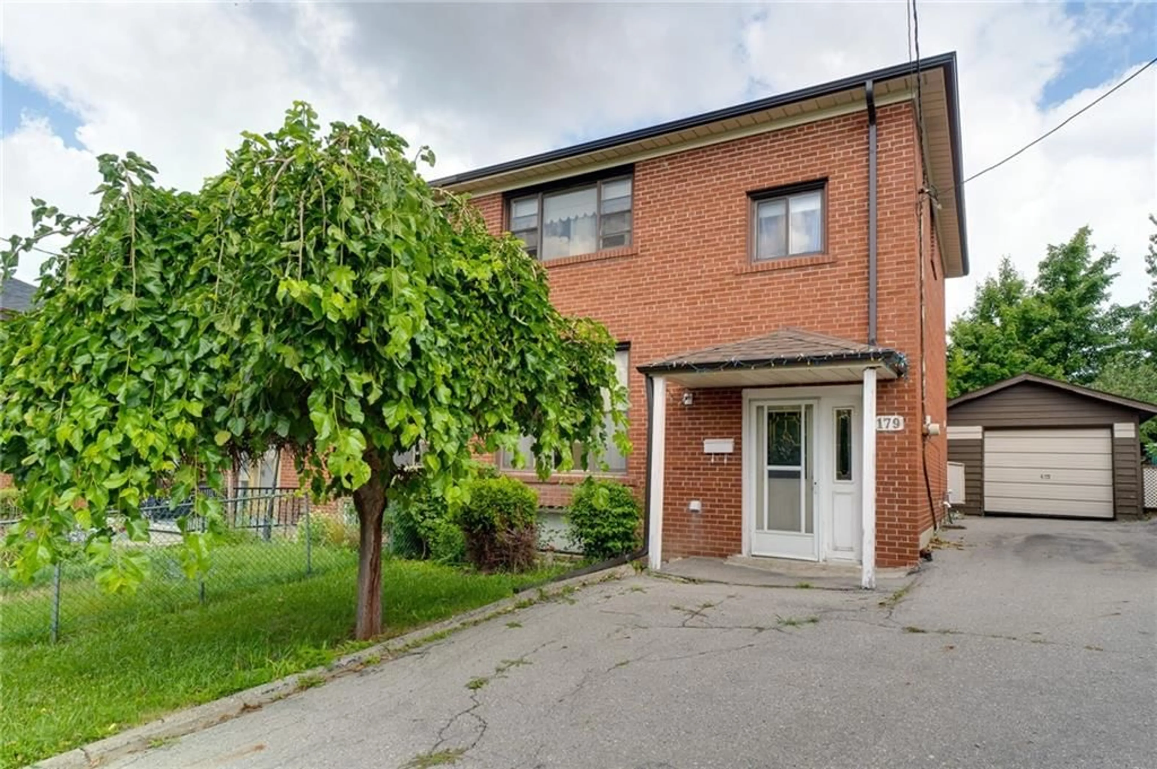 A pic from exterior of the house or condo, the street view for 179 HABITANT Dr, Toronto Ontario M9M 2P4