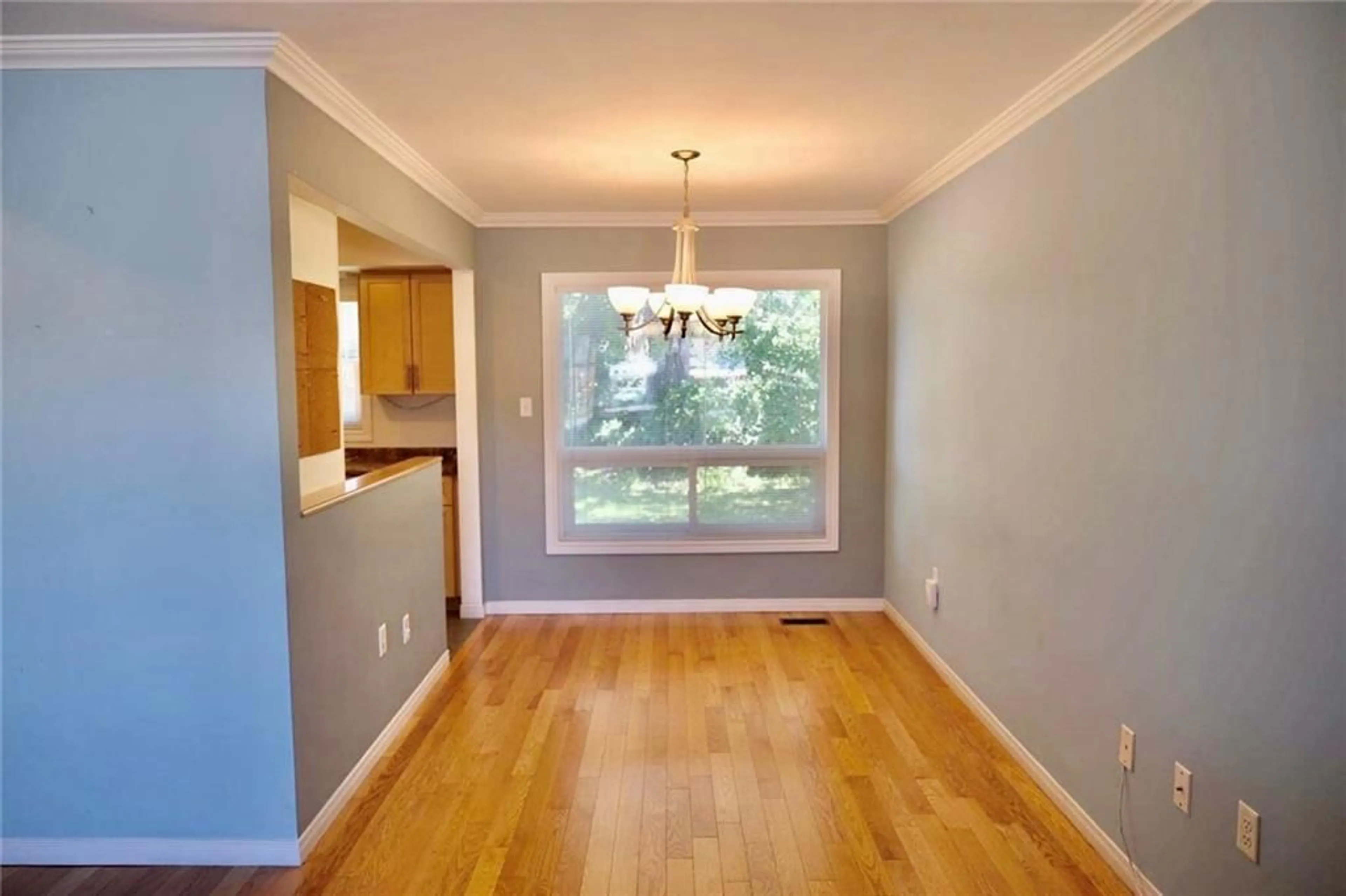 A pic of a room, wood floors for 597 UPPER OTTAWA St, Hamilton Ontario L8T 3T4