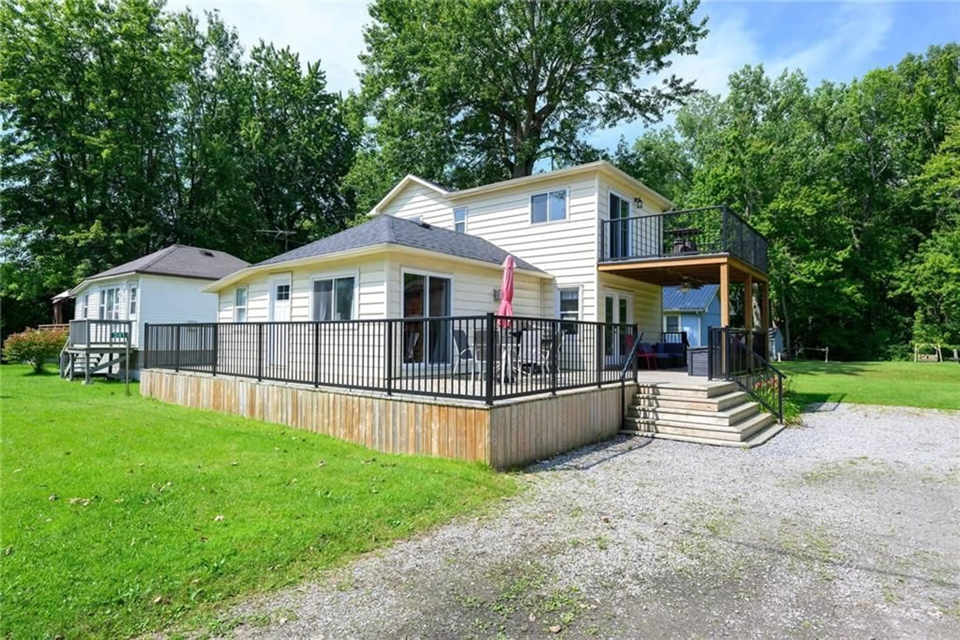 Frontside or backside of a home, cottage for 241 CEDAR Dr, Turkey Point Ontario N0E 1T0