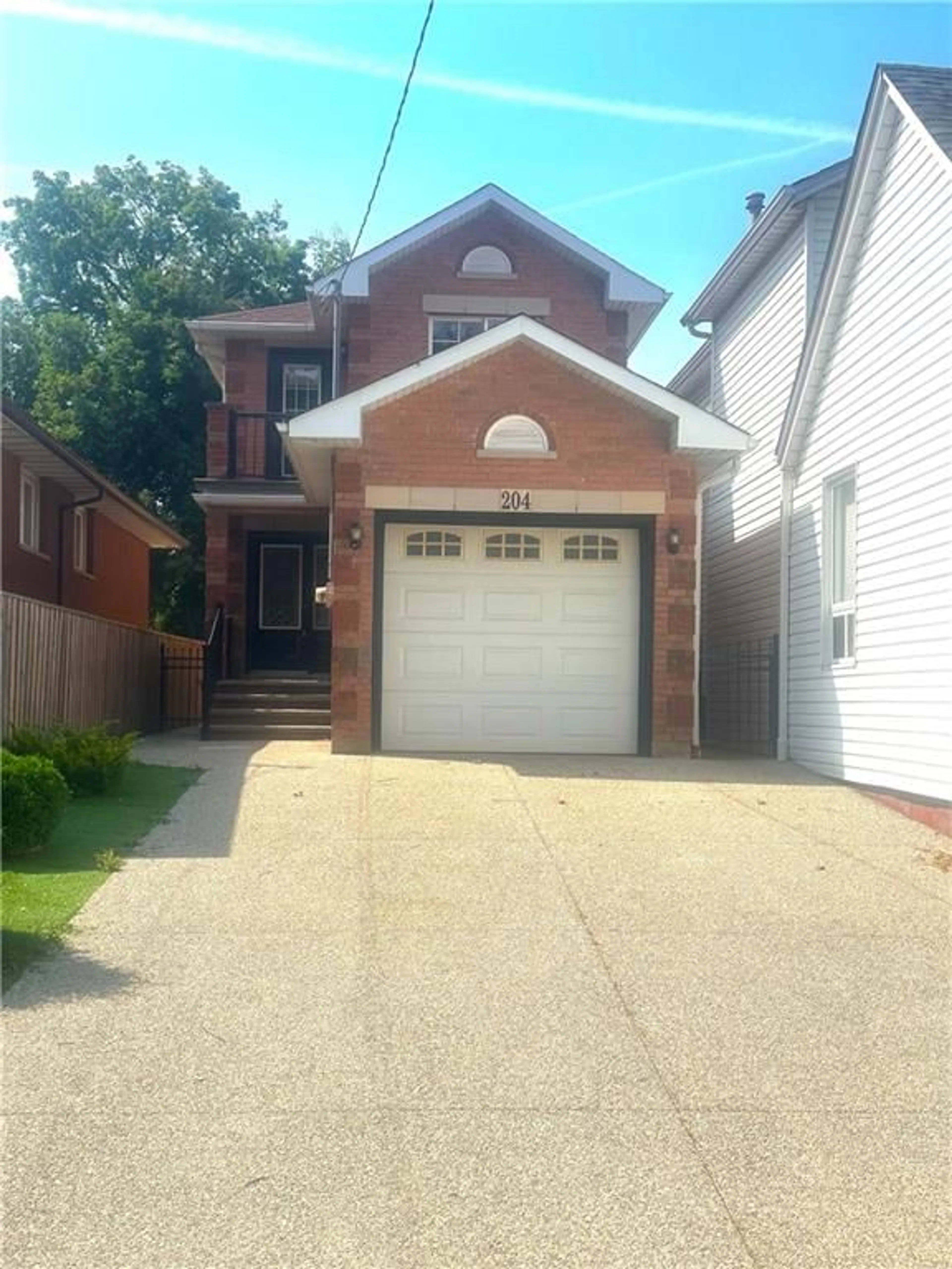 Frontside or backside of a home for 204 Picton St, Hamilton Ontario L8L 3W9