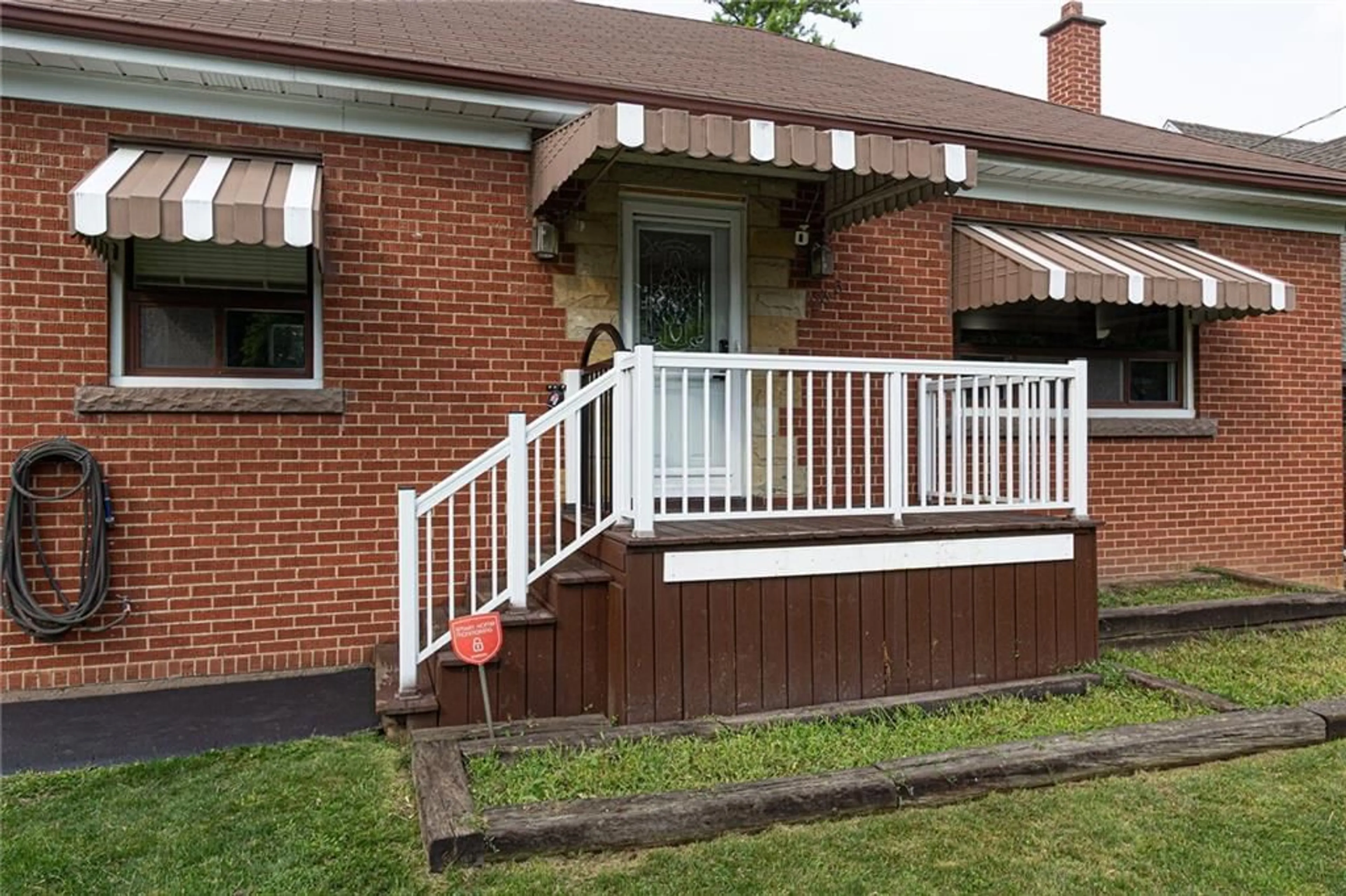 Home with brick exterior material for 233 CORONATION Ave, Hamilton Ontario L8K 1Z4