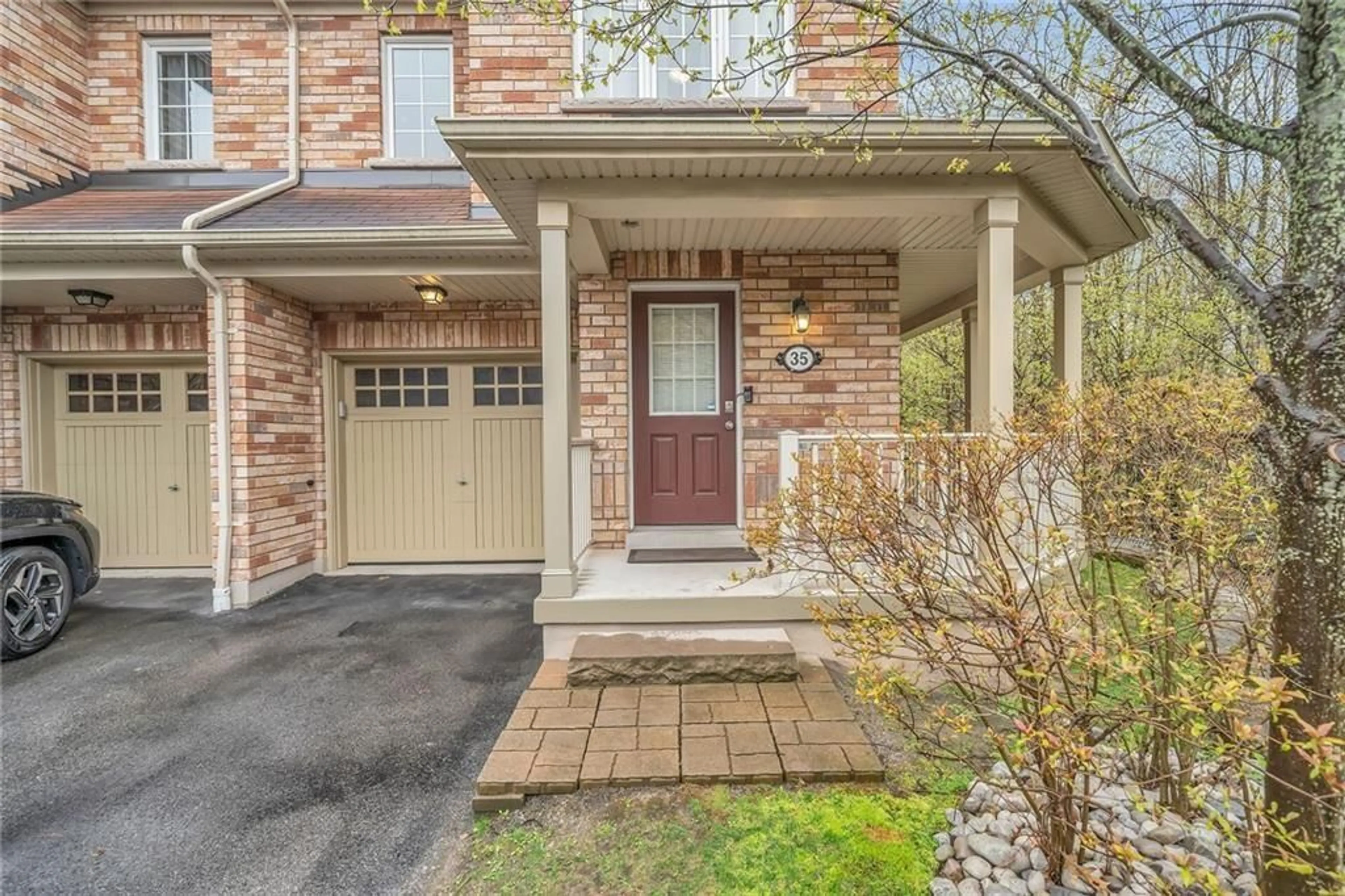 Home with brick exterior material for 233 DUSKYWING Way #35, Oakville Ontario L6L 0C5