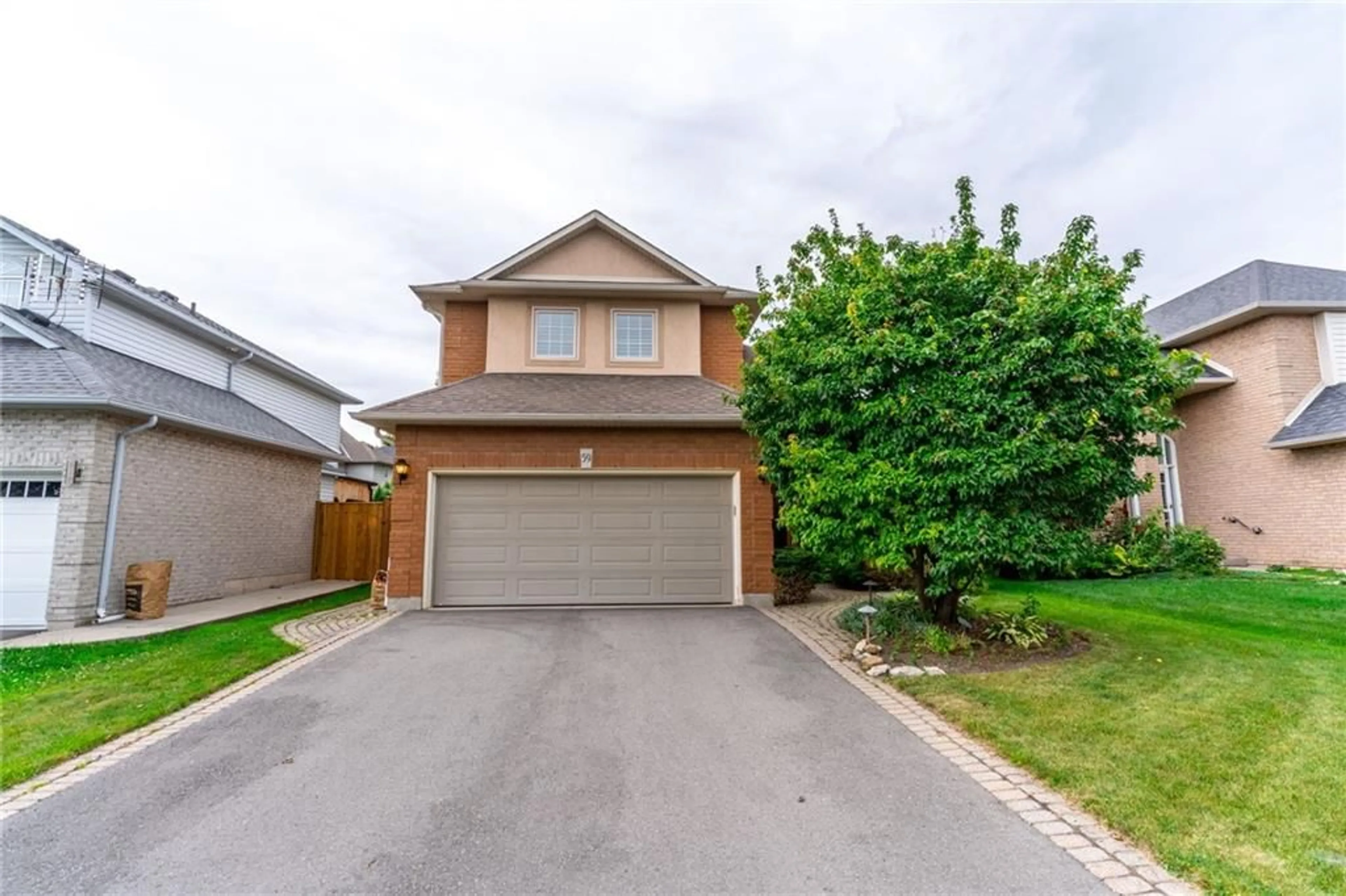 Frontside or backside of a home for 59 Longyear Dr, Waterdown Ontario L8B 0N8