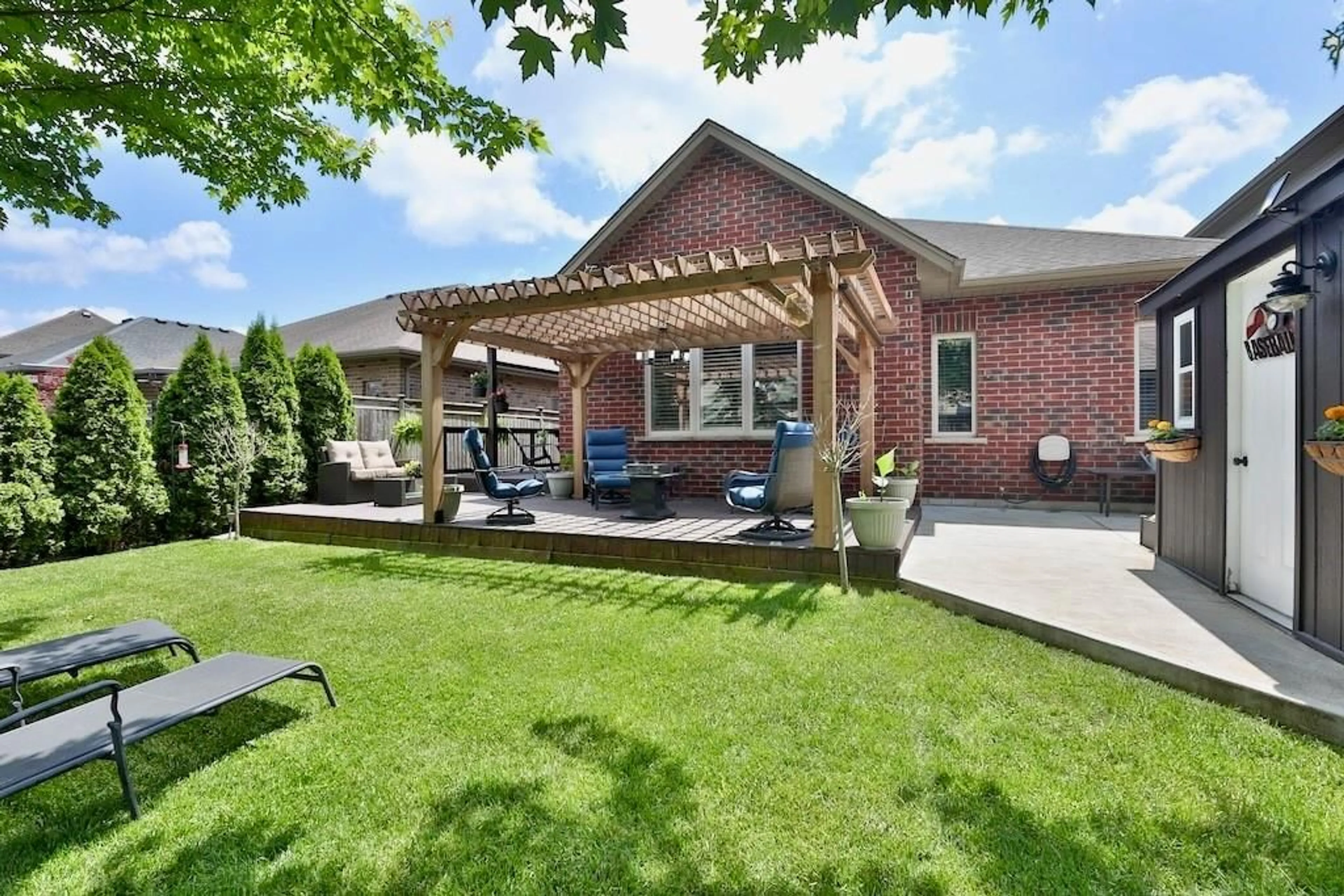 Patio, the fenced backyard for 120 Creekside Dr, Welland Ontario L3C 0B4