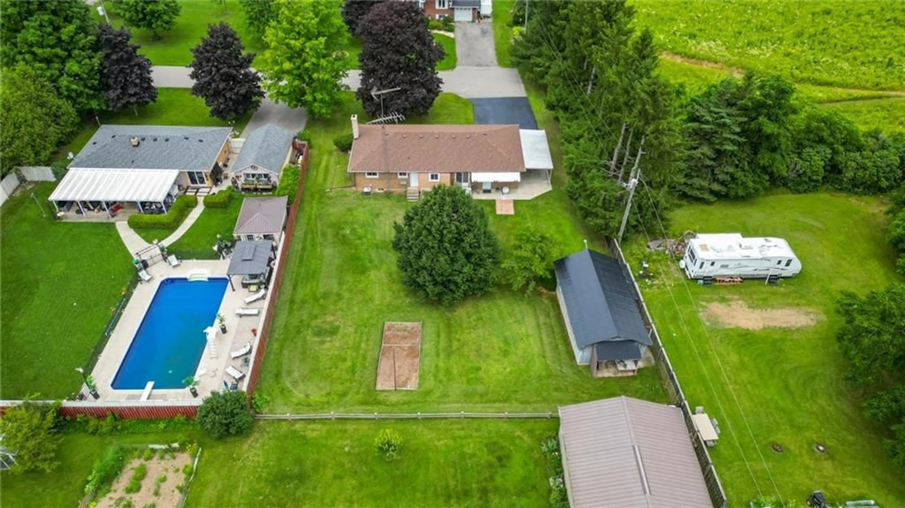 Frontside or backside of a home, the fenced backyard for 50 LORNE Ave, Brant Ontario N0E 1A0