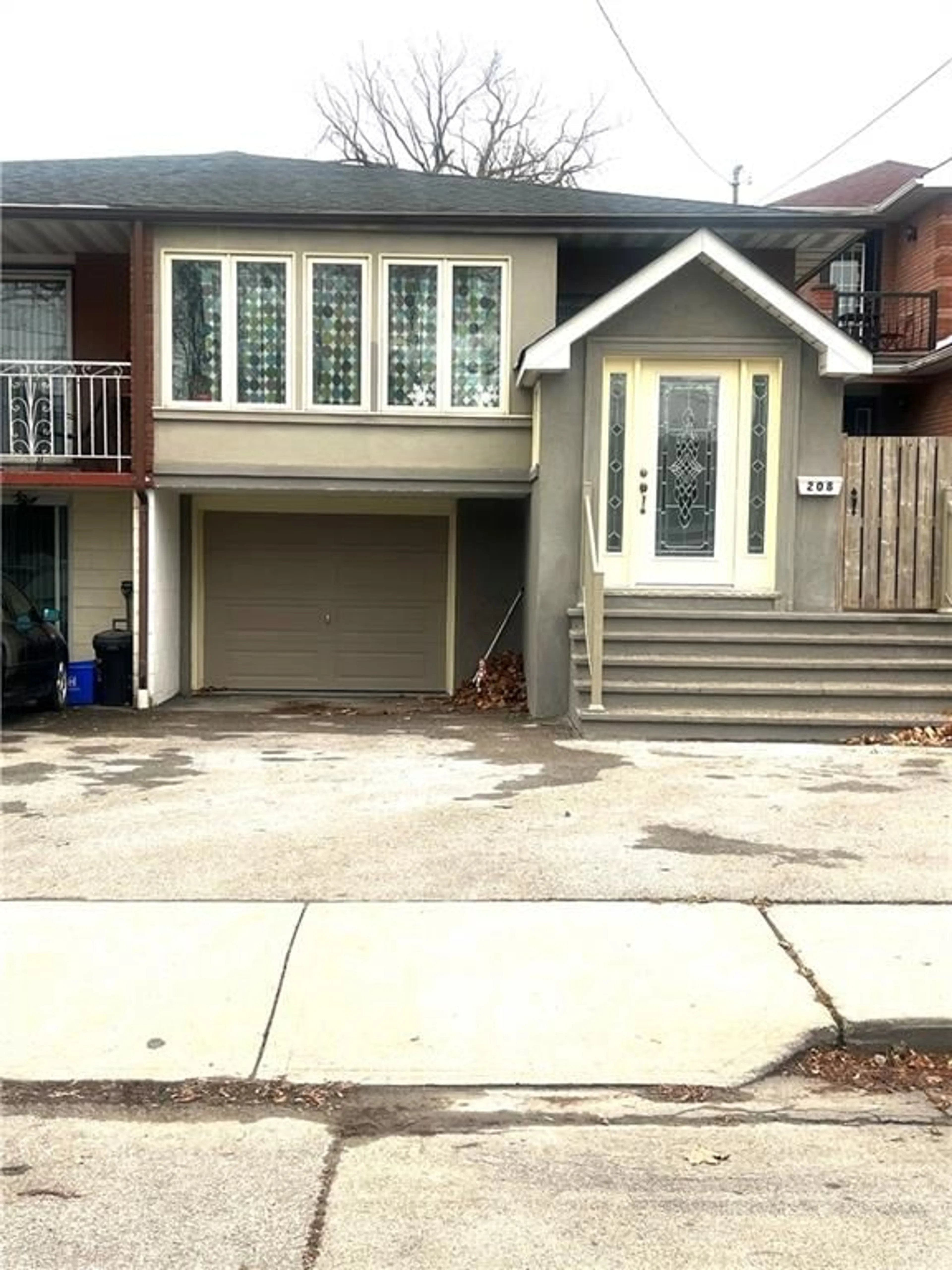 Frontside or backside of a home, cottage for 208 PICTON St, Hamilton Ontario L8L 3W9