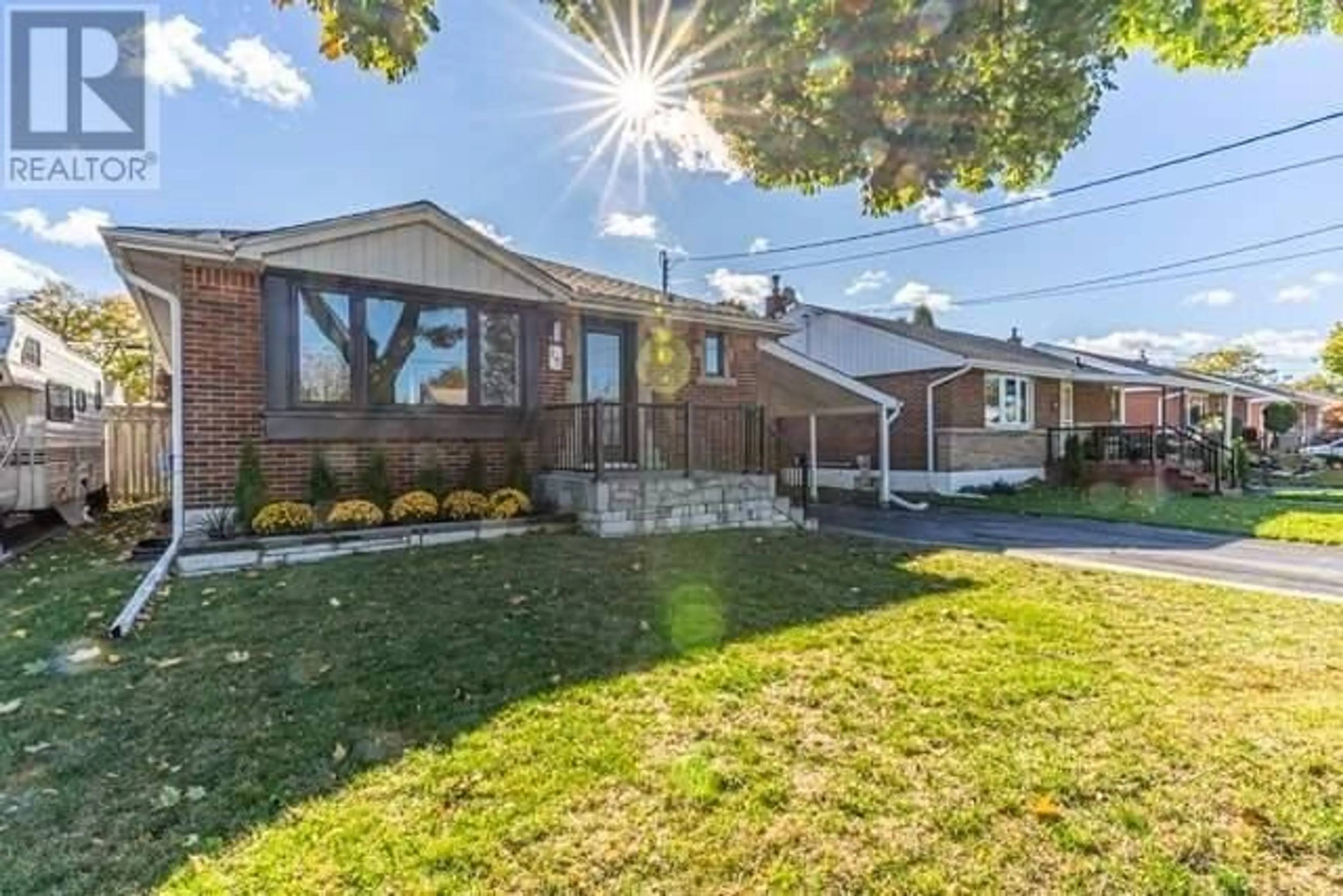 Home with brick exterior material for 15 Greenwood St, Hamilton Ontario L8T 3N2