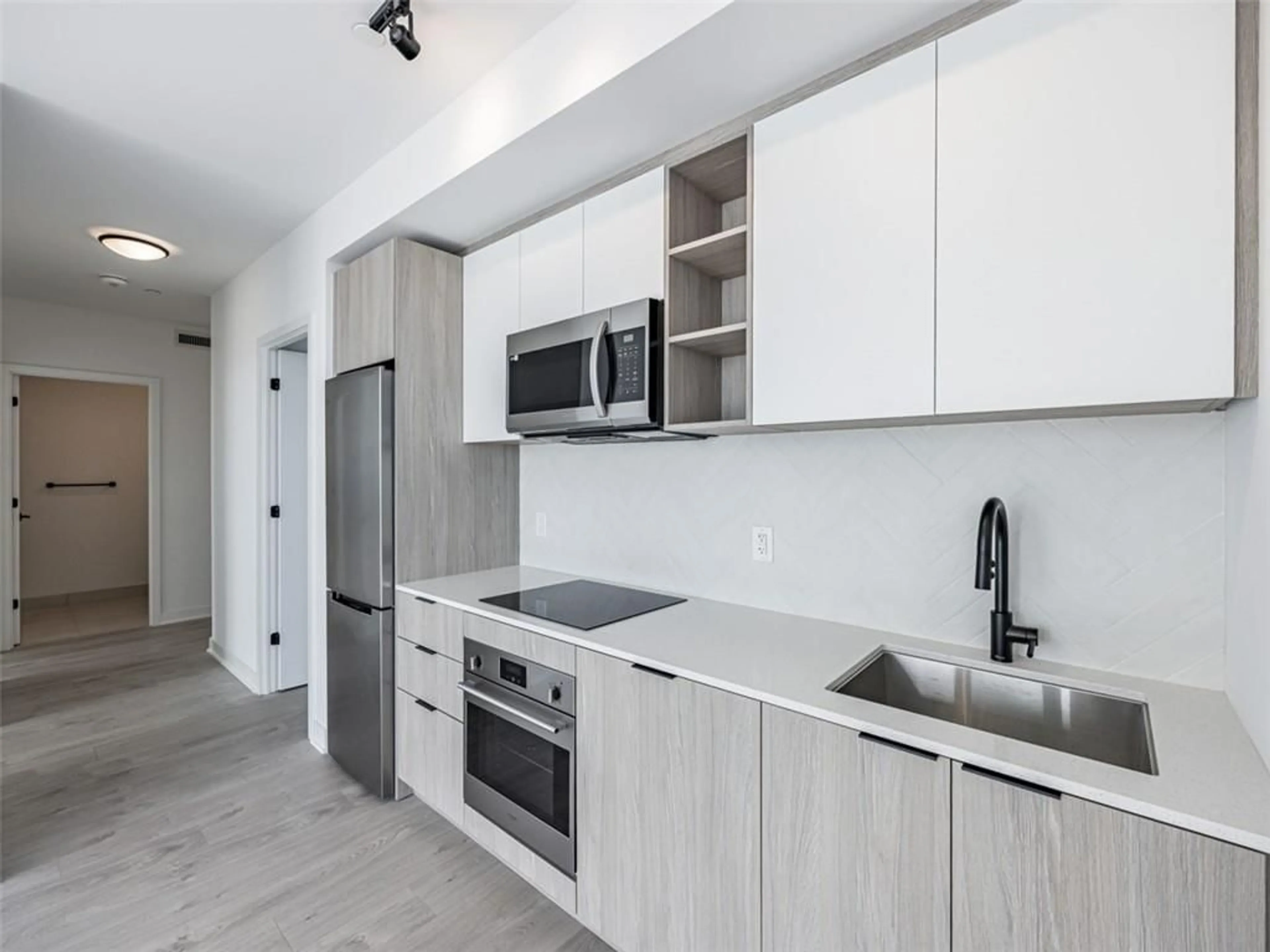 Standard kitchen, wood floors for 36 ZORRA St #1808, Toronto Ontario M8Z 0G5