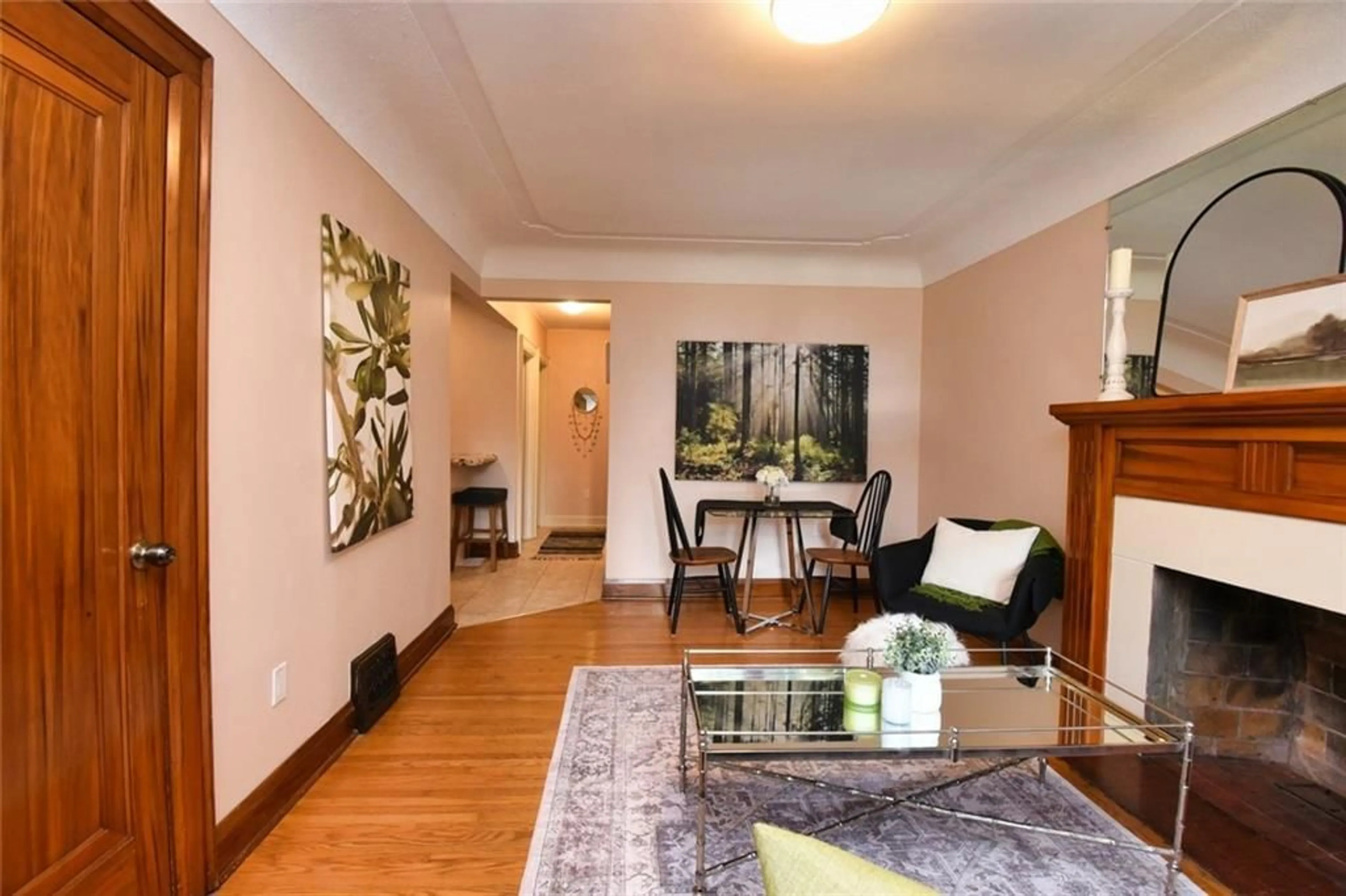 Living room, wood floors for 122 HADDON Ave, Hamilton Ontario L8S 1X8