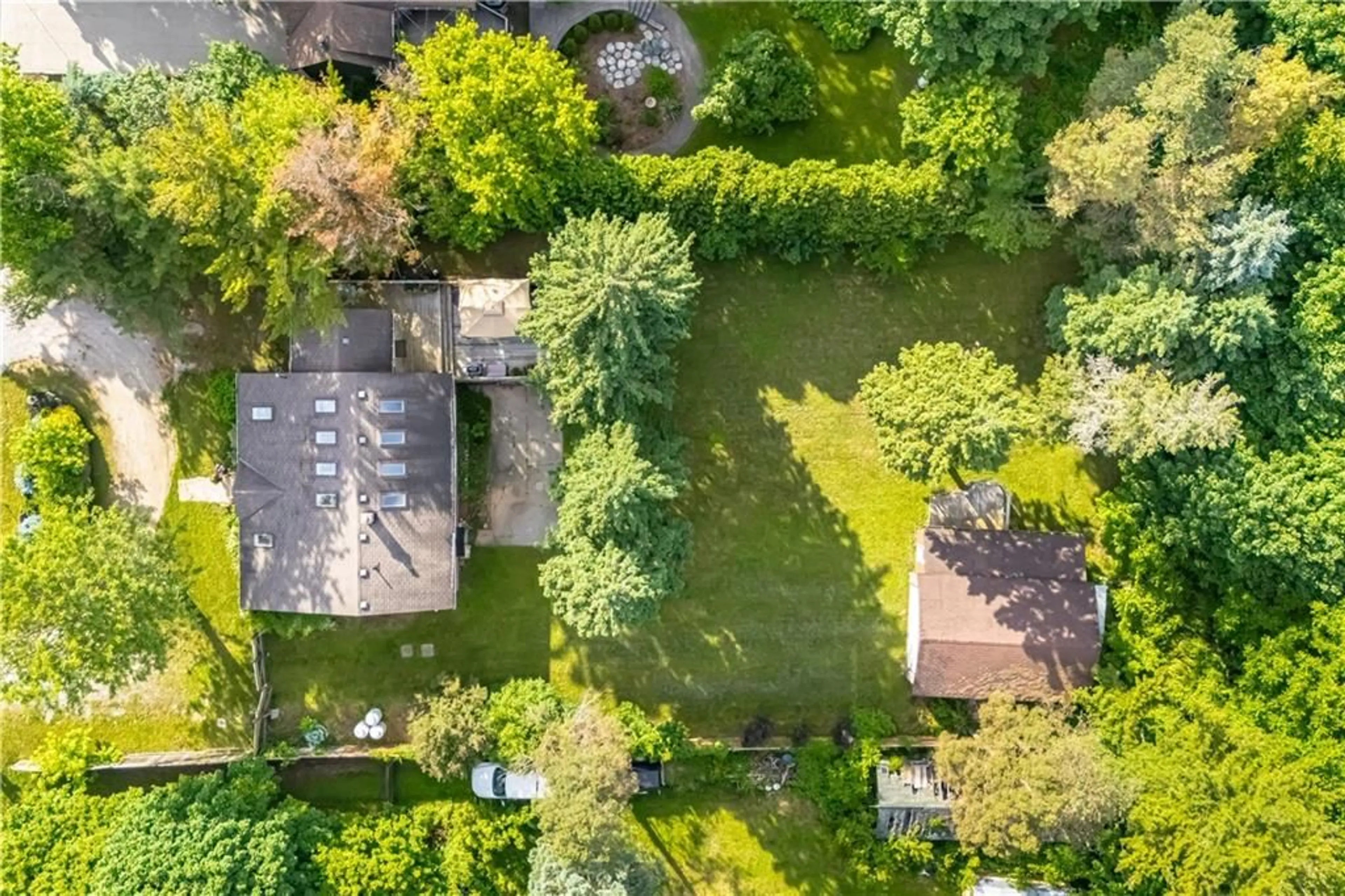 Frontside or backside of a home, the fenced backyard for 8045 APPLEBY Line, Milton Ontario L9E 0M4