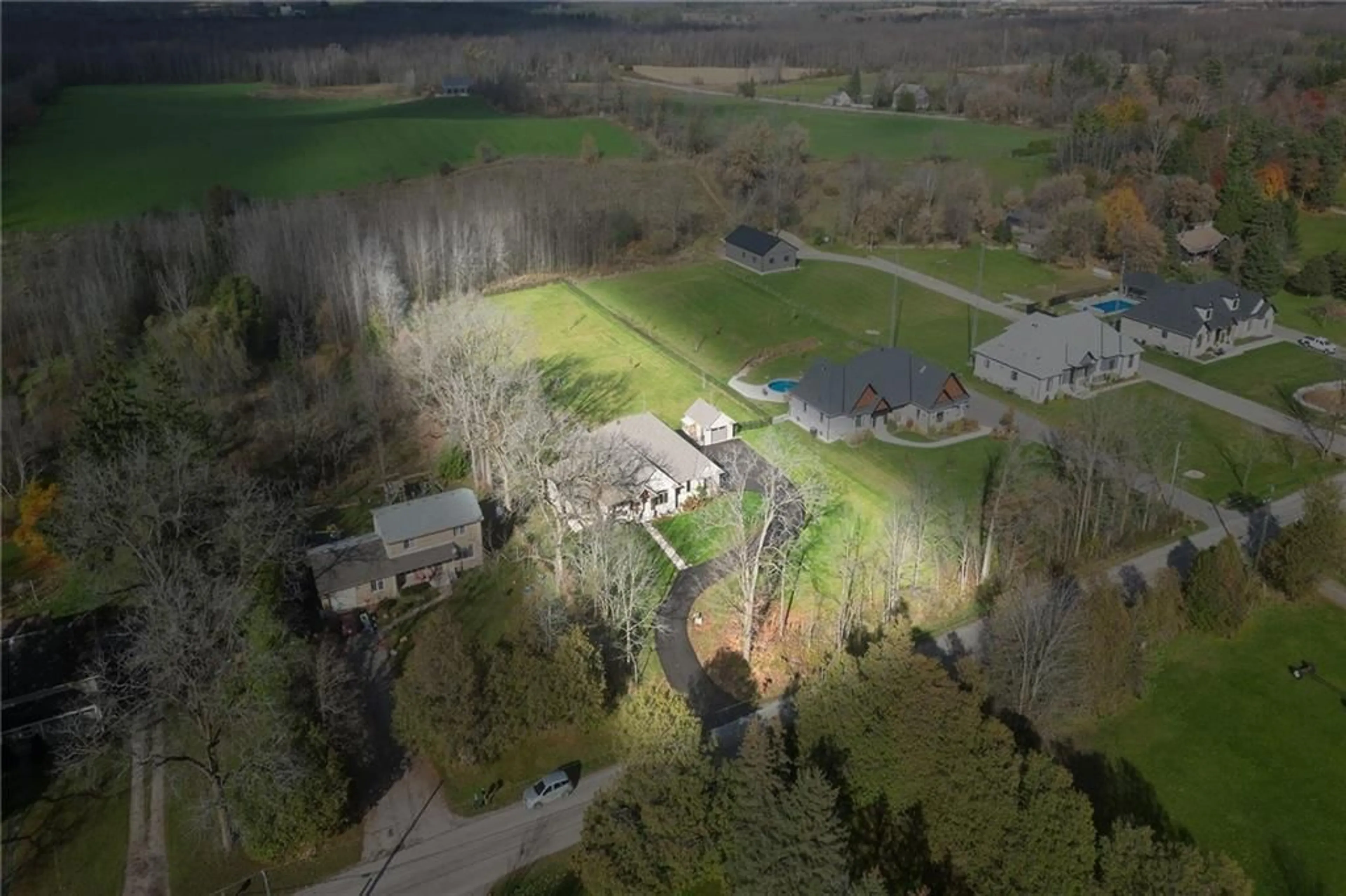 A pic from exterior of the house or condo, the fenced backyard for 1897 CONCESSION 8 Rd, Hamilton Ontario N1R 5S2