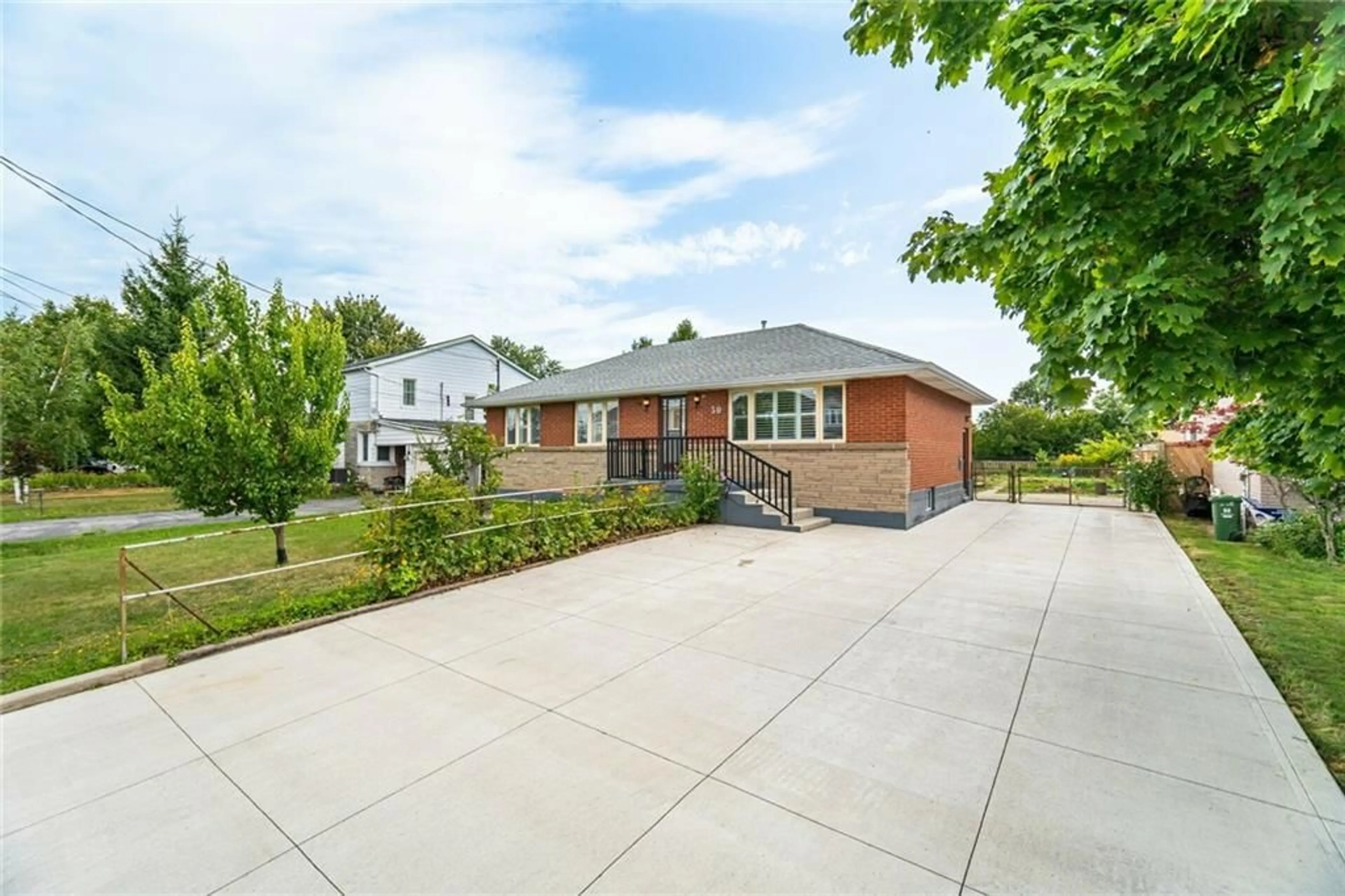 Frontside or backside of a home, the fenced backyard for 30 NORWICH Rd, Stoney Creek Ontario L8E 1Z8