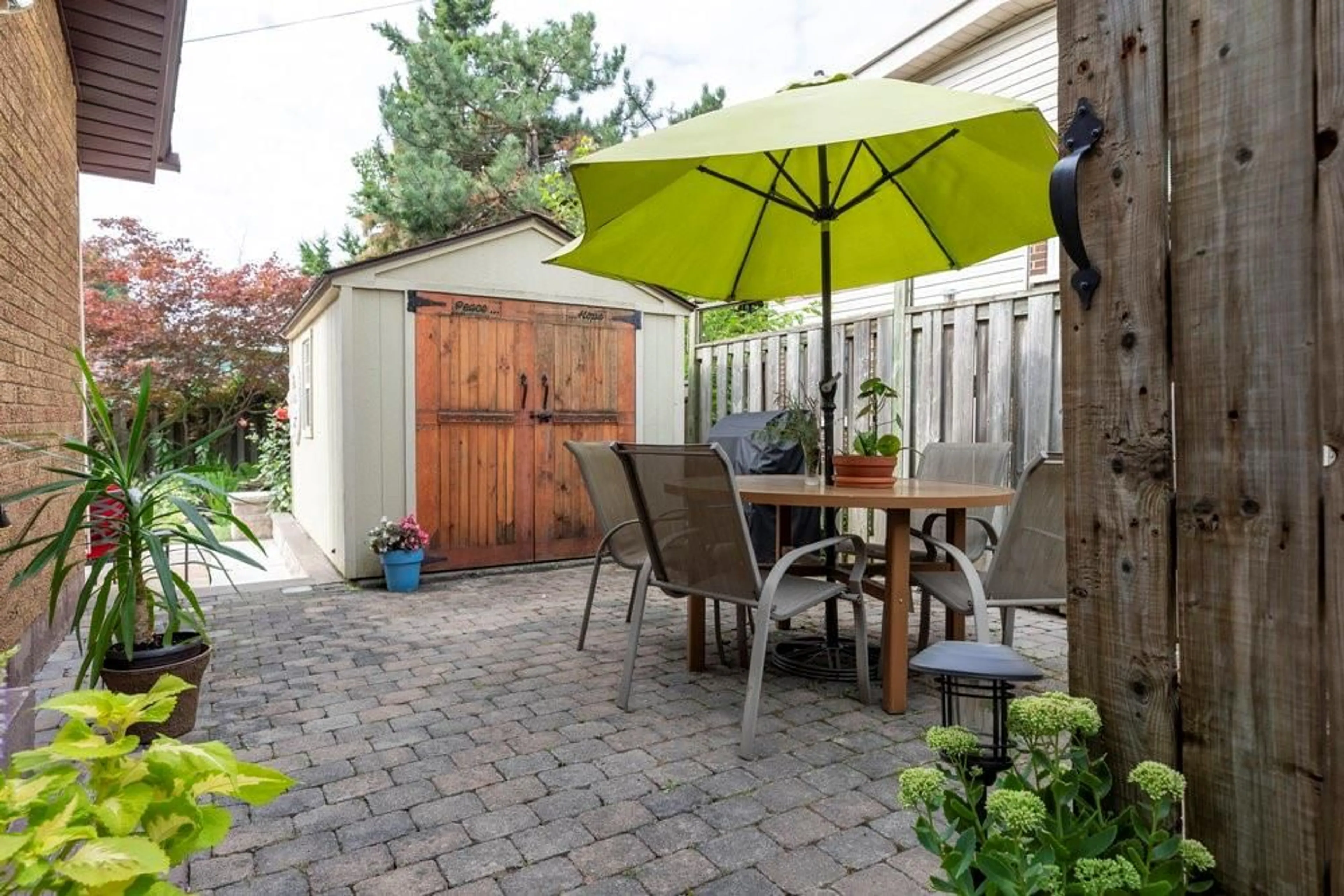 Patio, the fenced backyard for 79 SANATORIUM Rd, Hamilton Ontario L9C 1Y4