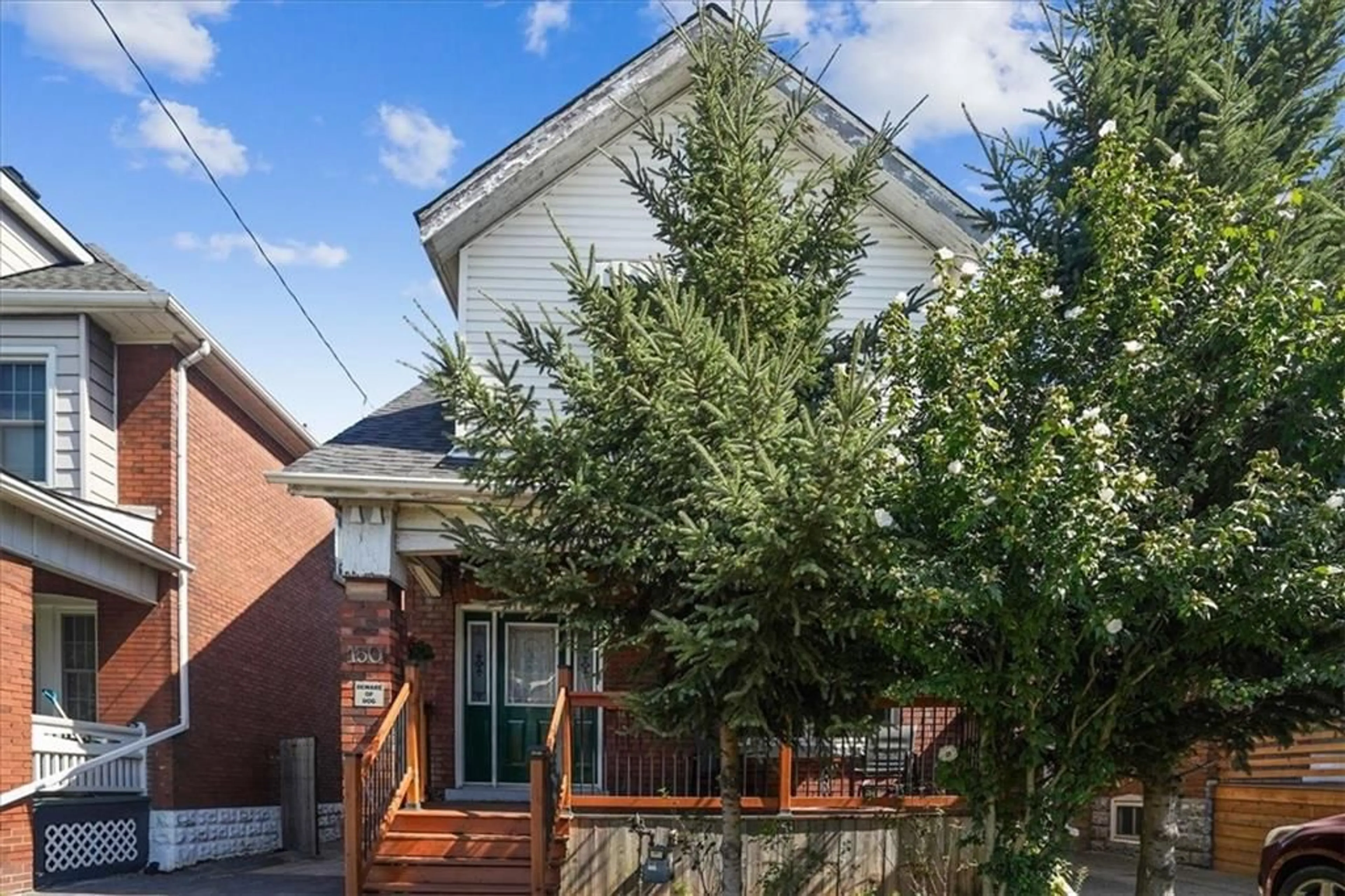 Frontside or backside of a home, the fenced backyard for 150 PROSPECT St, Hamilton Ontario L8L 6X7