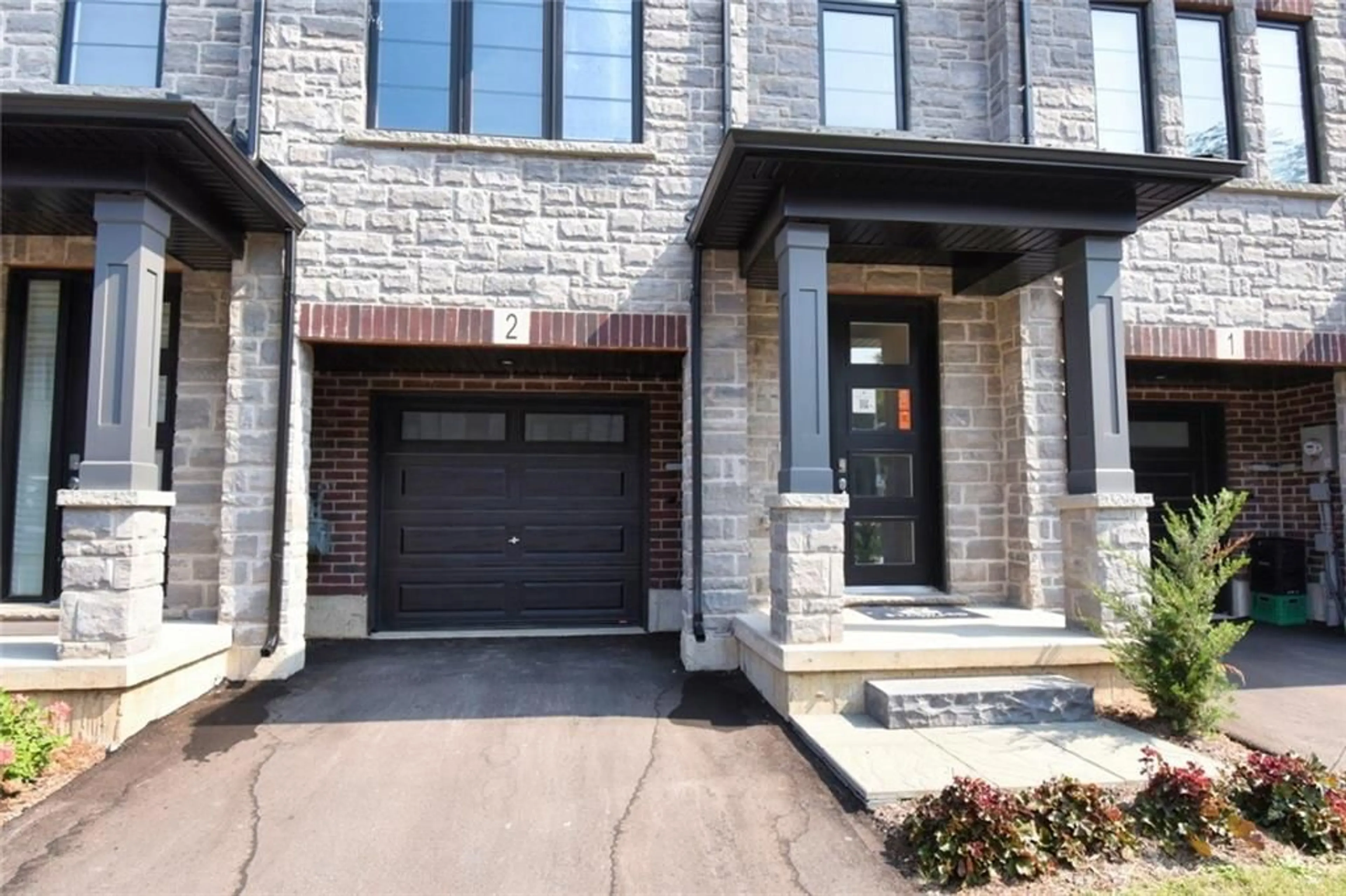 Home with brick exterior material for 187 WILSON St #2, Ancaster Ontario L9G 1N4