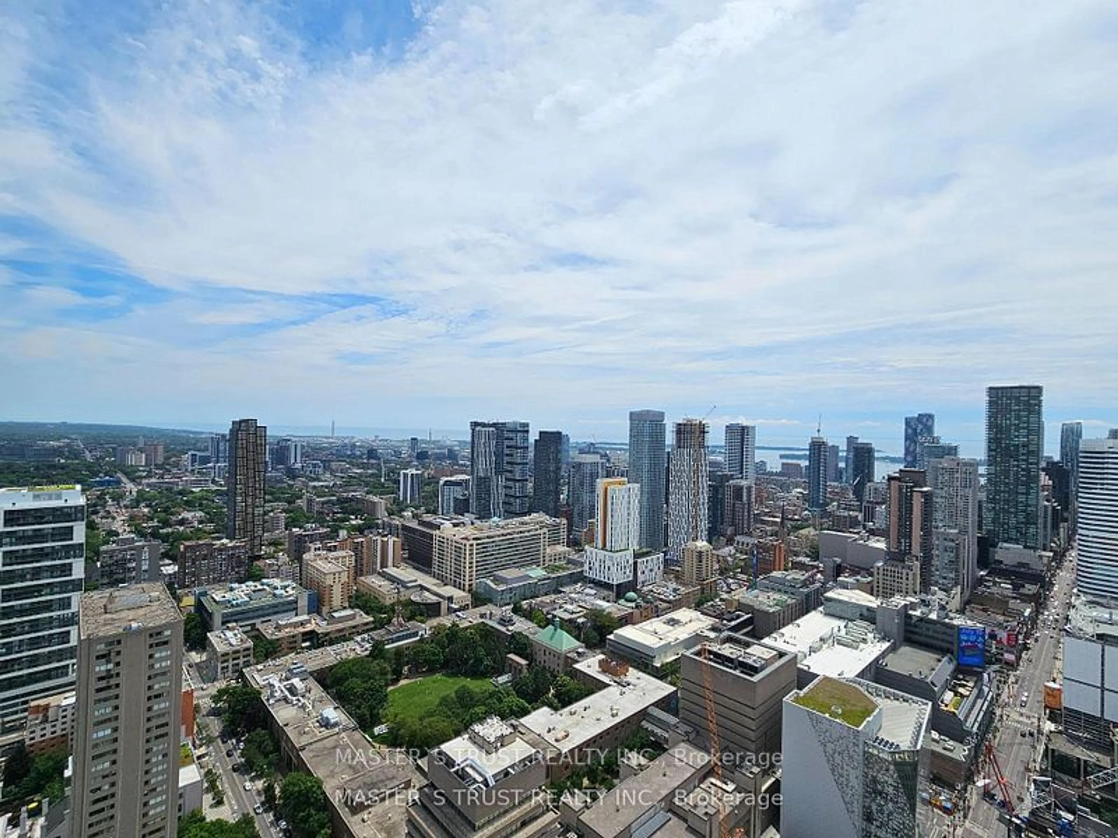 A pic from exterior of the house or condo, the view of city buildings for 386 Yonge St #4604, Toronto Ontario M5B 0A5