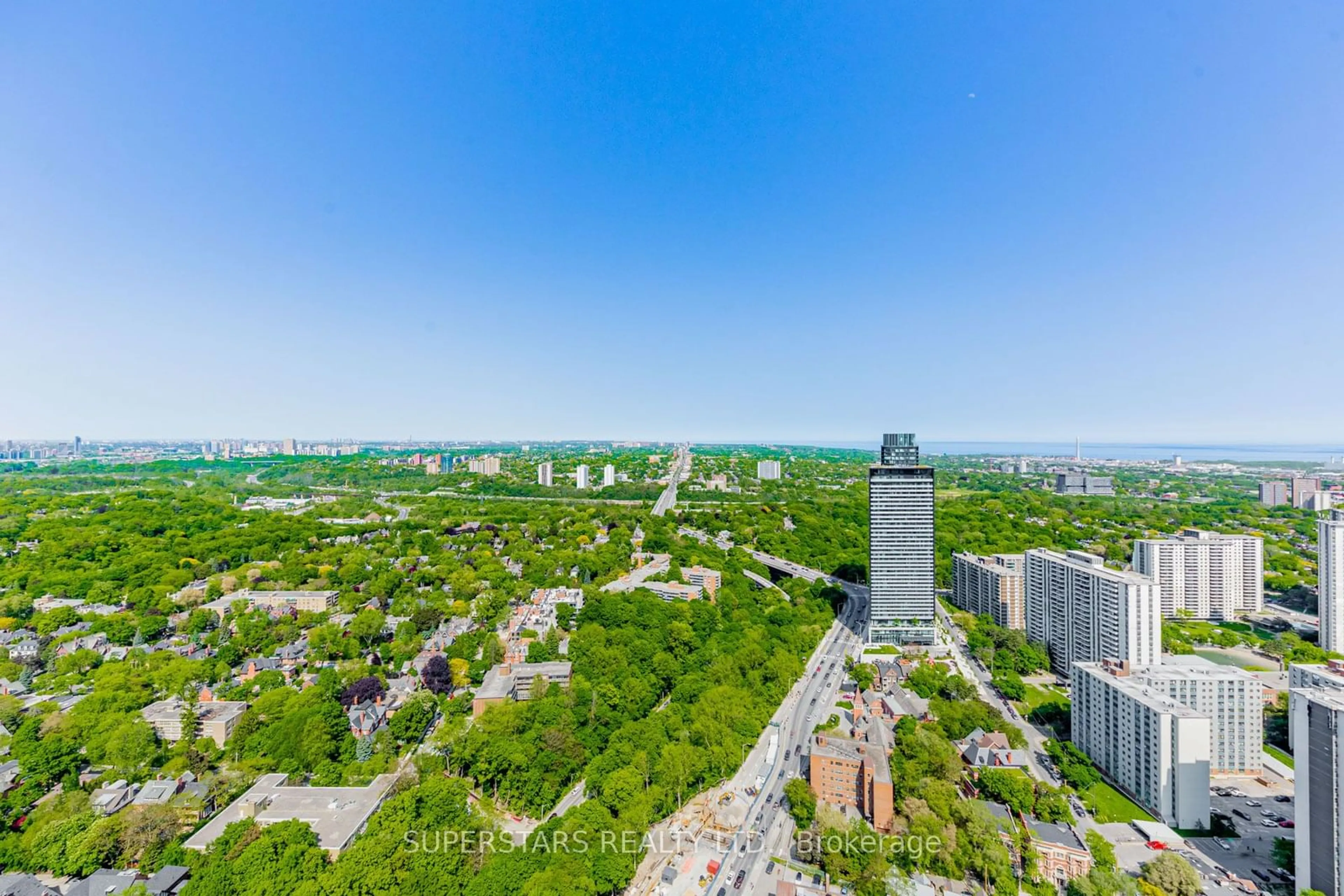 A pic from exterior of the house or condo, the view of city buildings for 395 Bloor St #4508, Toronto Ontario M4W 0B4