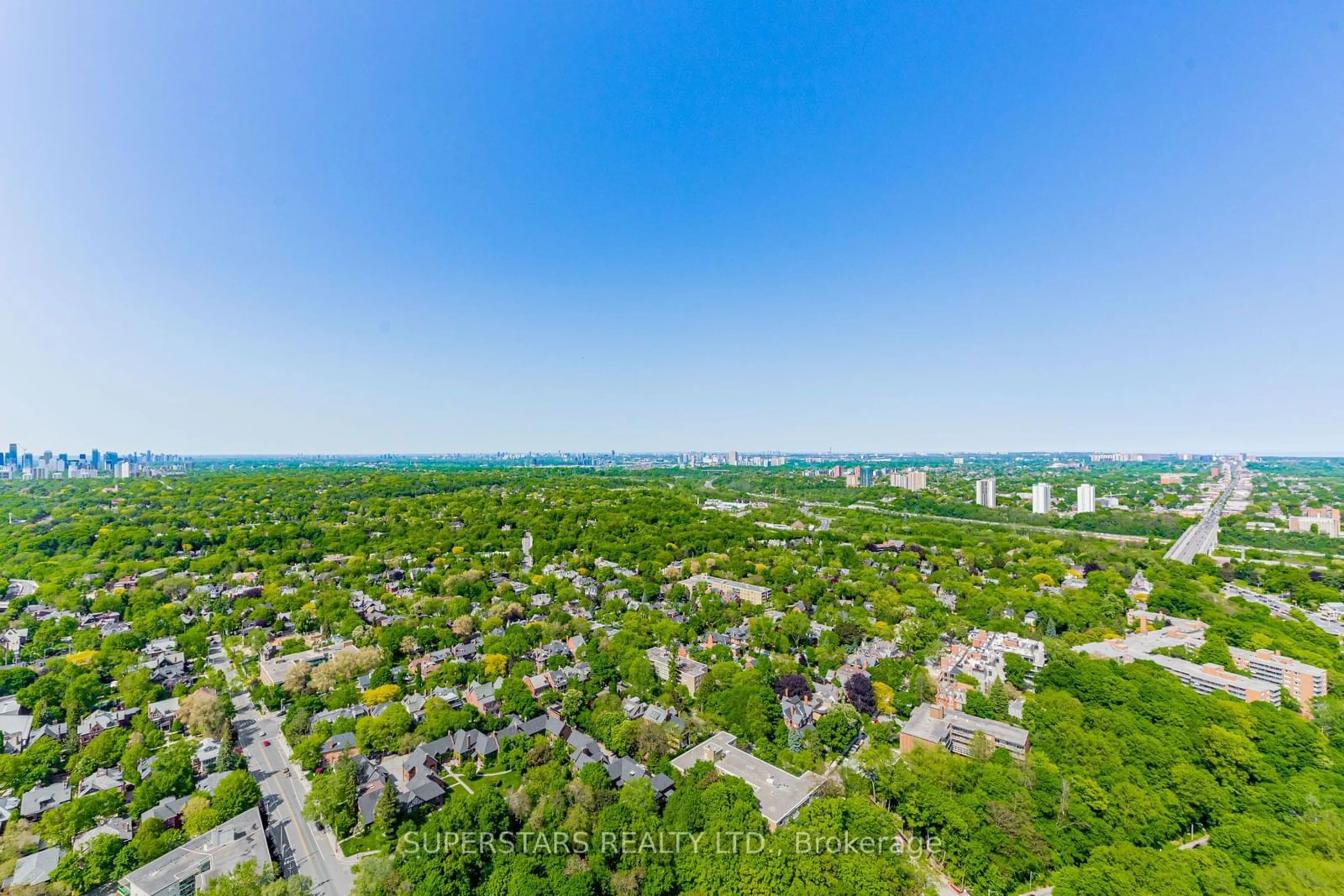 A pic from exterior of the house or condo, the view of city buildings for 395 Bloor St #4508, Toronto Ontario M4W 0B4