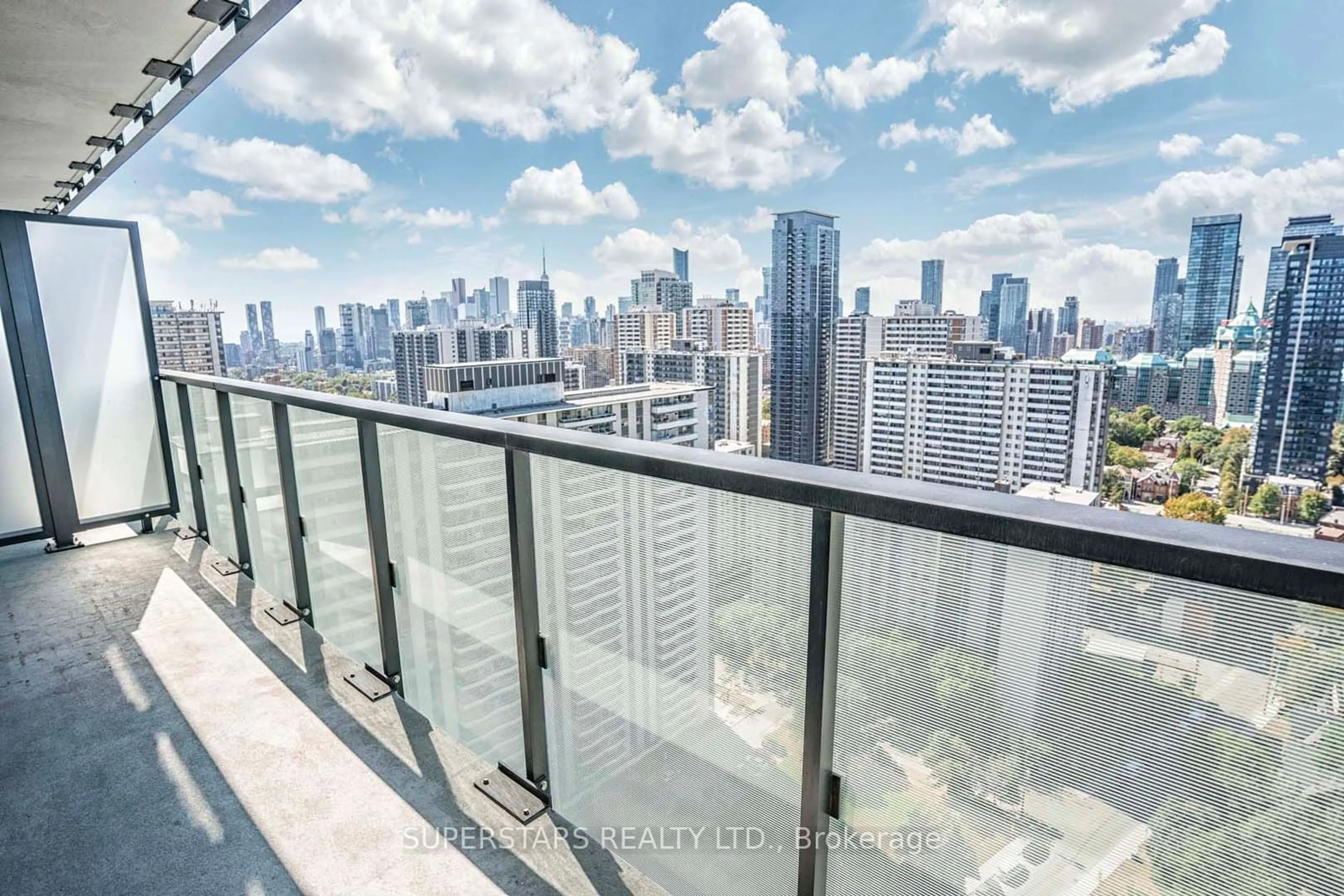 Balcony in the apartment, the view of city buildings for 575 Bloor St #2611, Toronto Ontario M4W 0B2