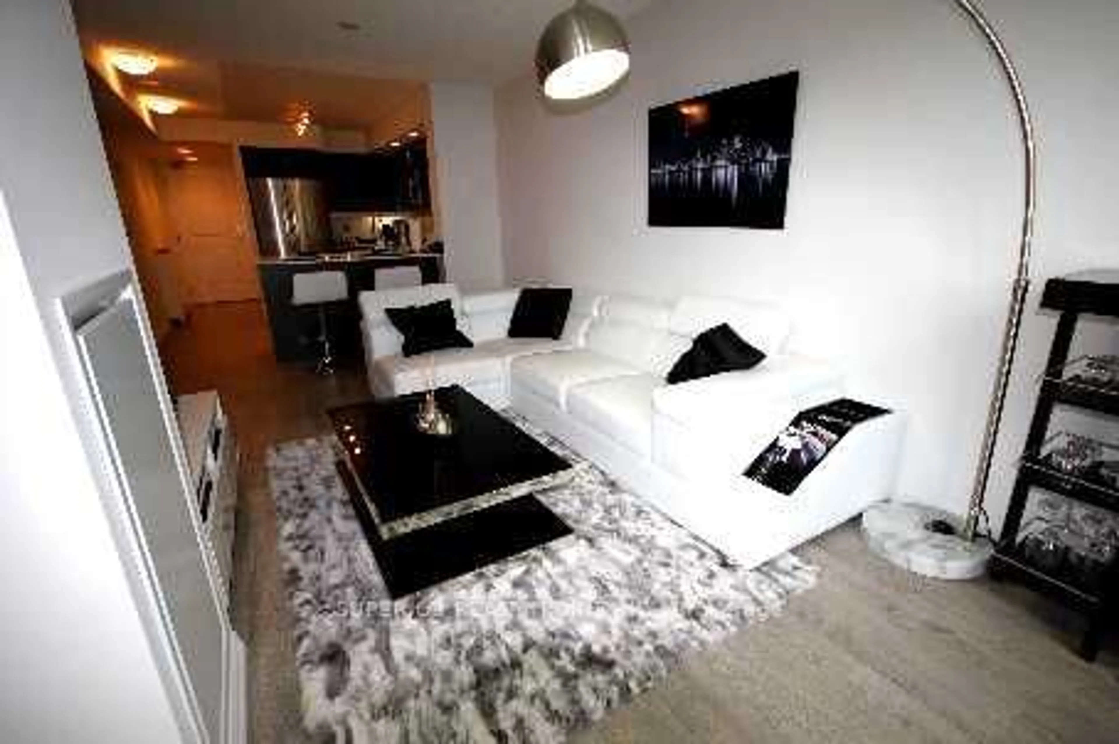 Living room, wood floors for 75 East Liberty St #902, Toronto Ontario M6K 3R3