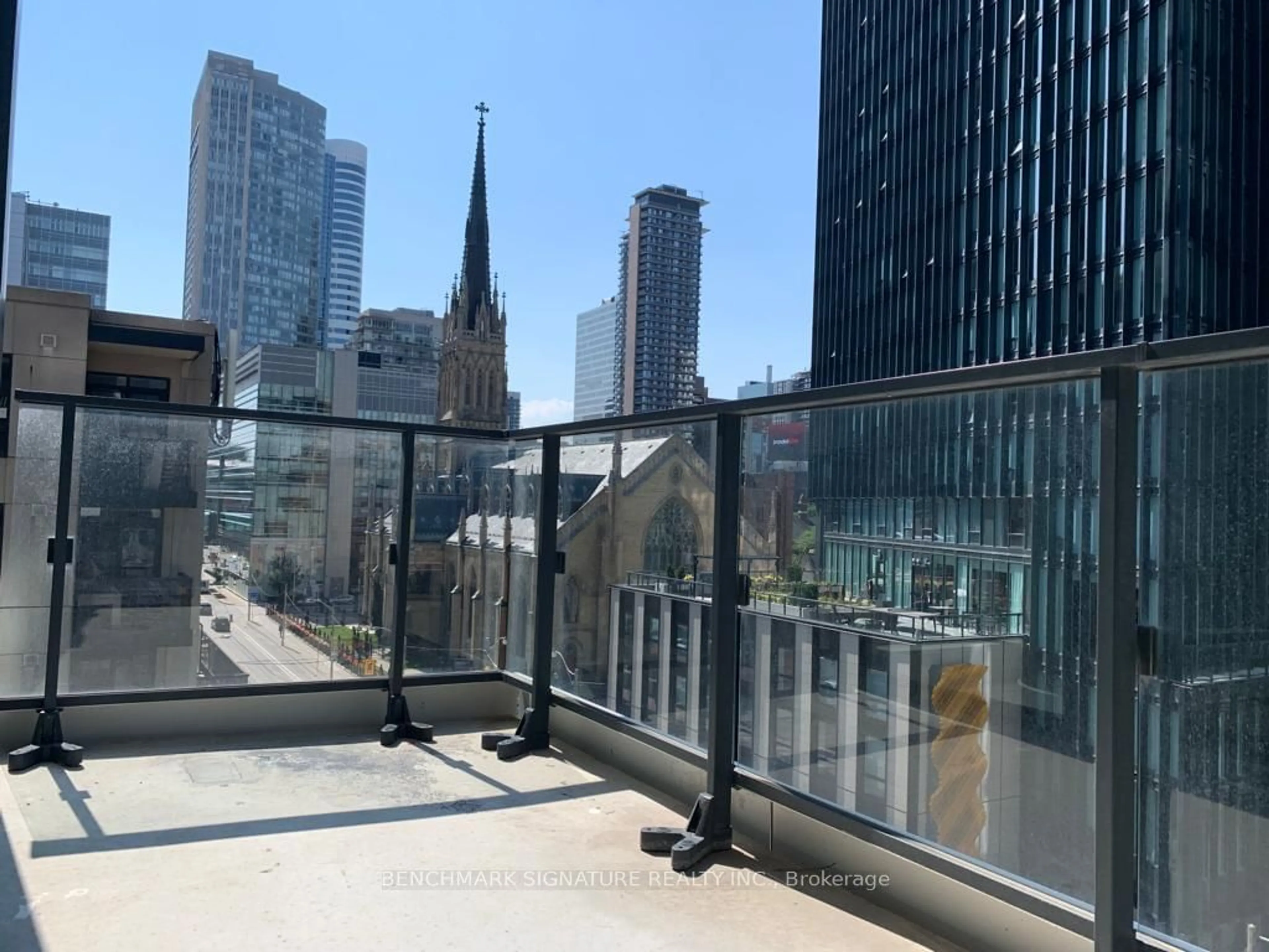 Balcony in the apartment, the view of city buildings for 77 Shuter St #721, Toronto Ontario M5B 0B8