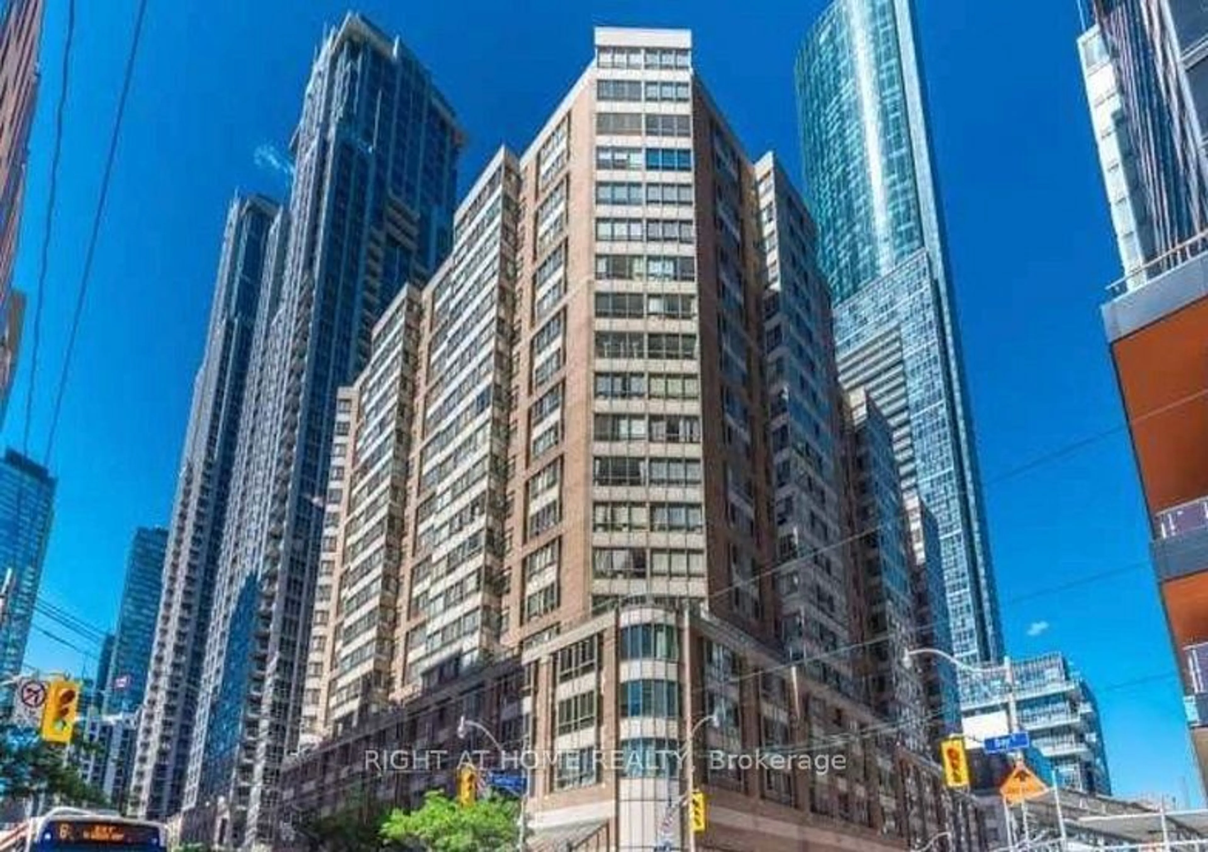 A pic from exterior of the house or condo, the view of city buildings for 711 Bay St #1616, Toronto Ontario M5G 2J8