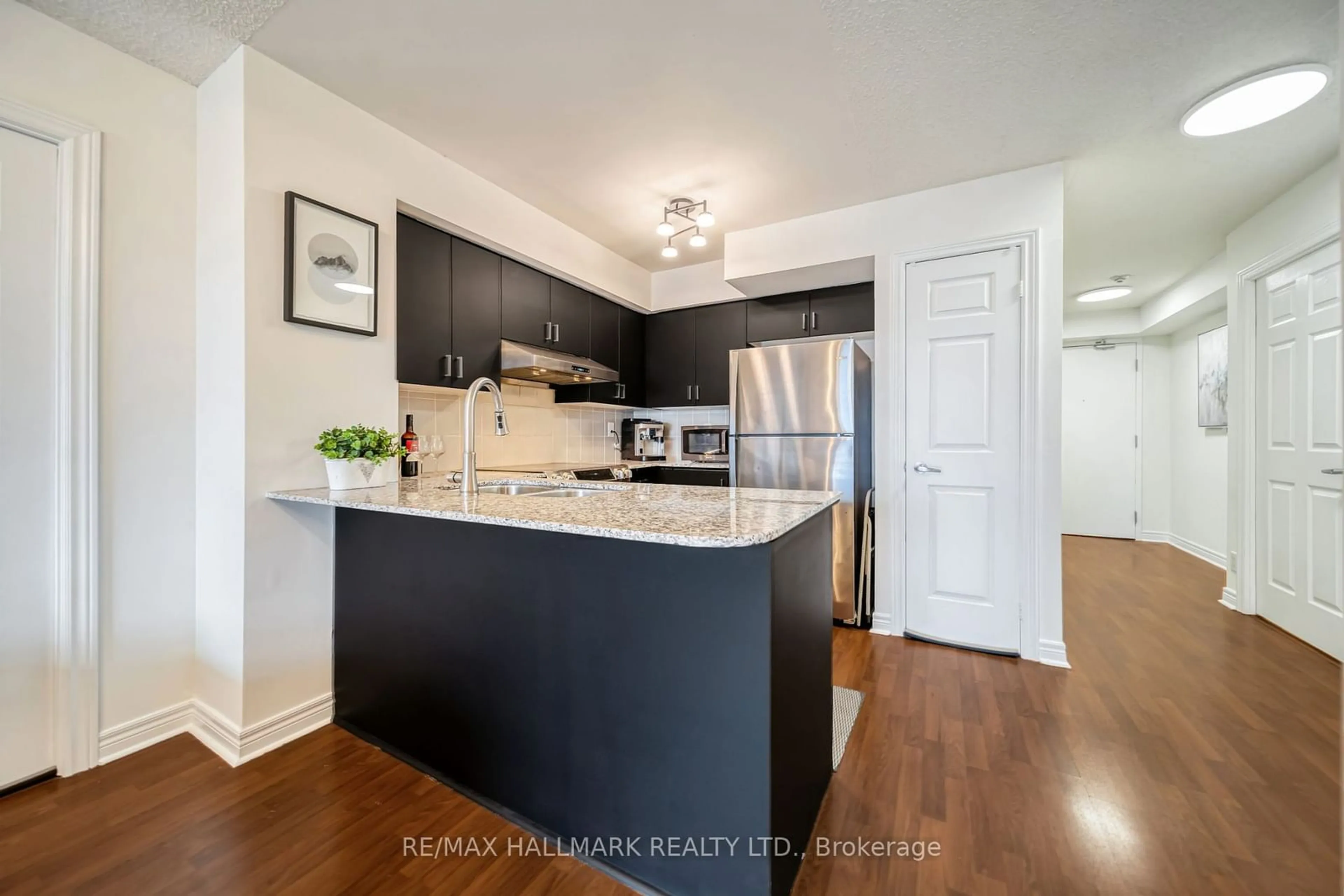 Open concept kitchen for 225 Wellesley St #1002, Toronto Ontario M4X 1X8