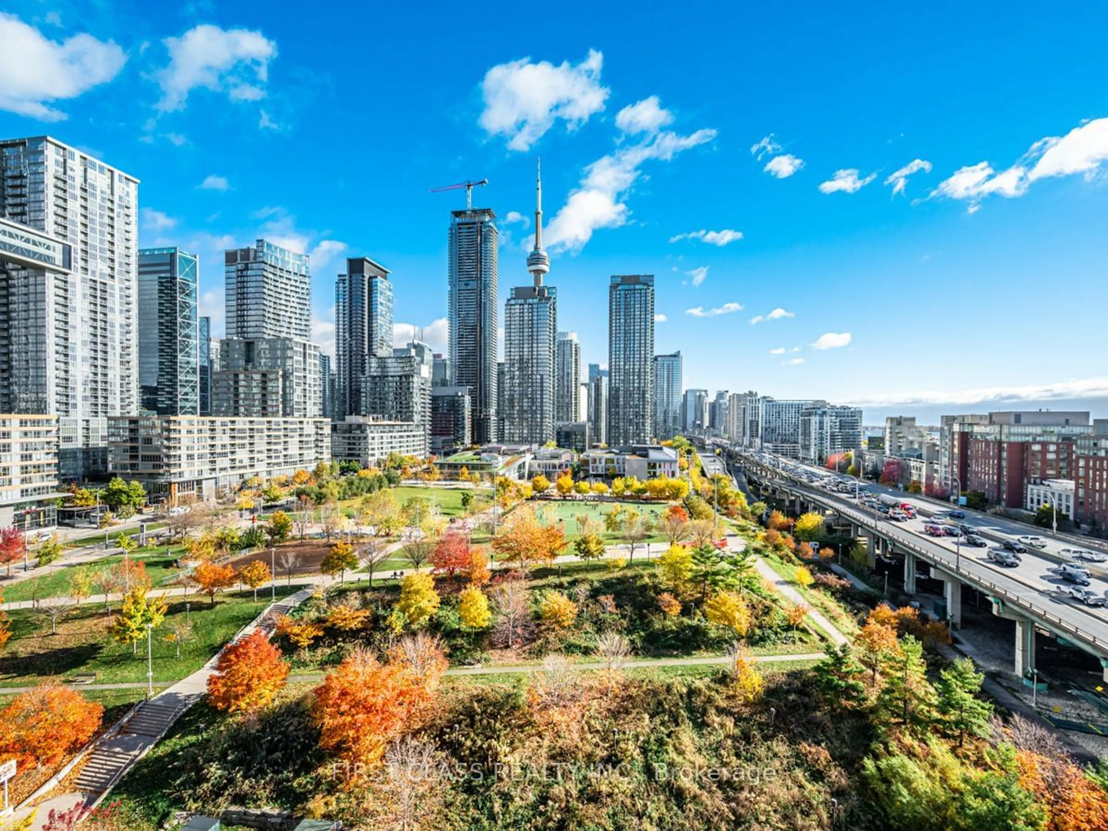 A pic from exterior of the house or condo, the view of city buildings for 75 Queens Wharf Rd #1206, Toronto Ontario M5V 0J8