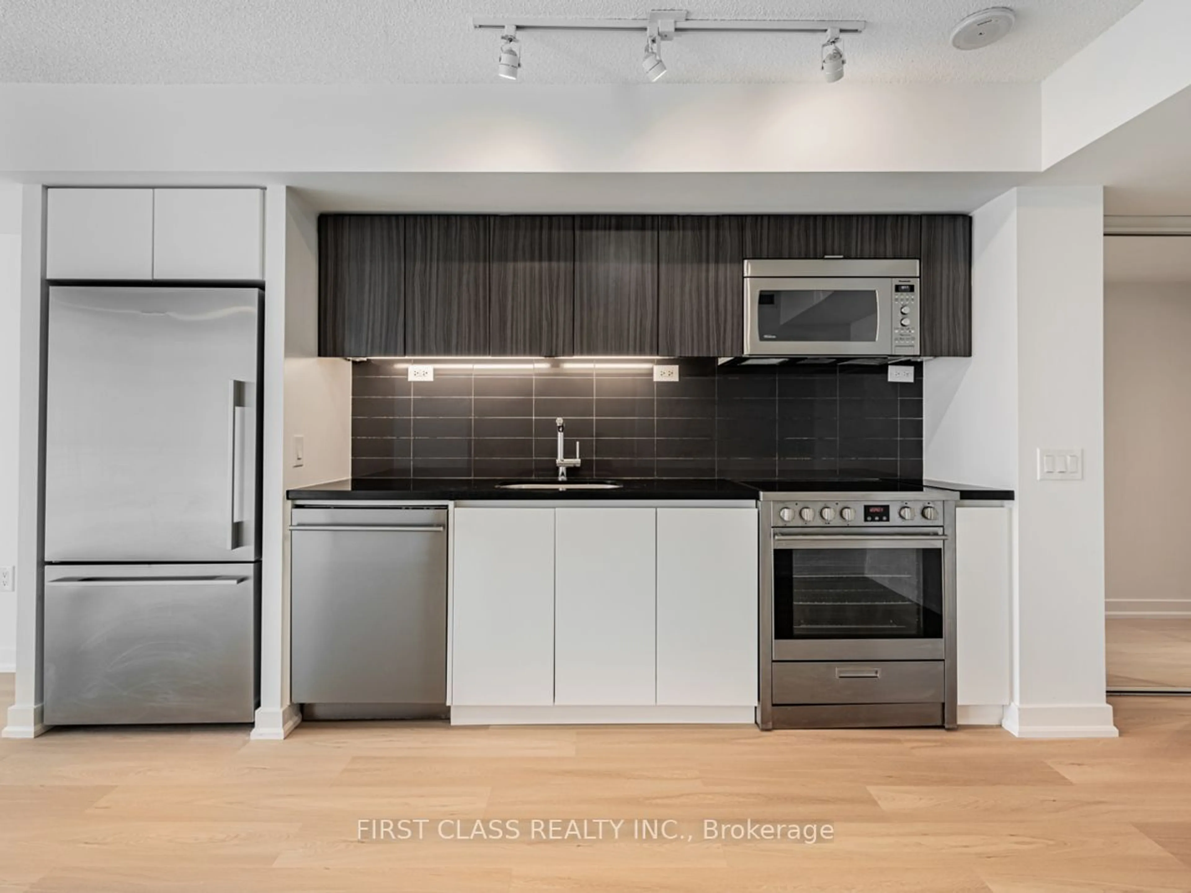 Standard kitchen, wood floors for 75 Queens Wharf Rd #1206, Toronto Ontario M5V 0J8