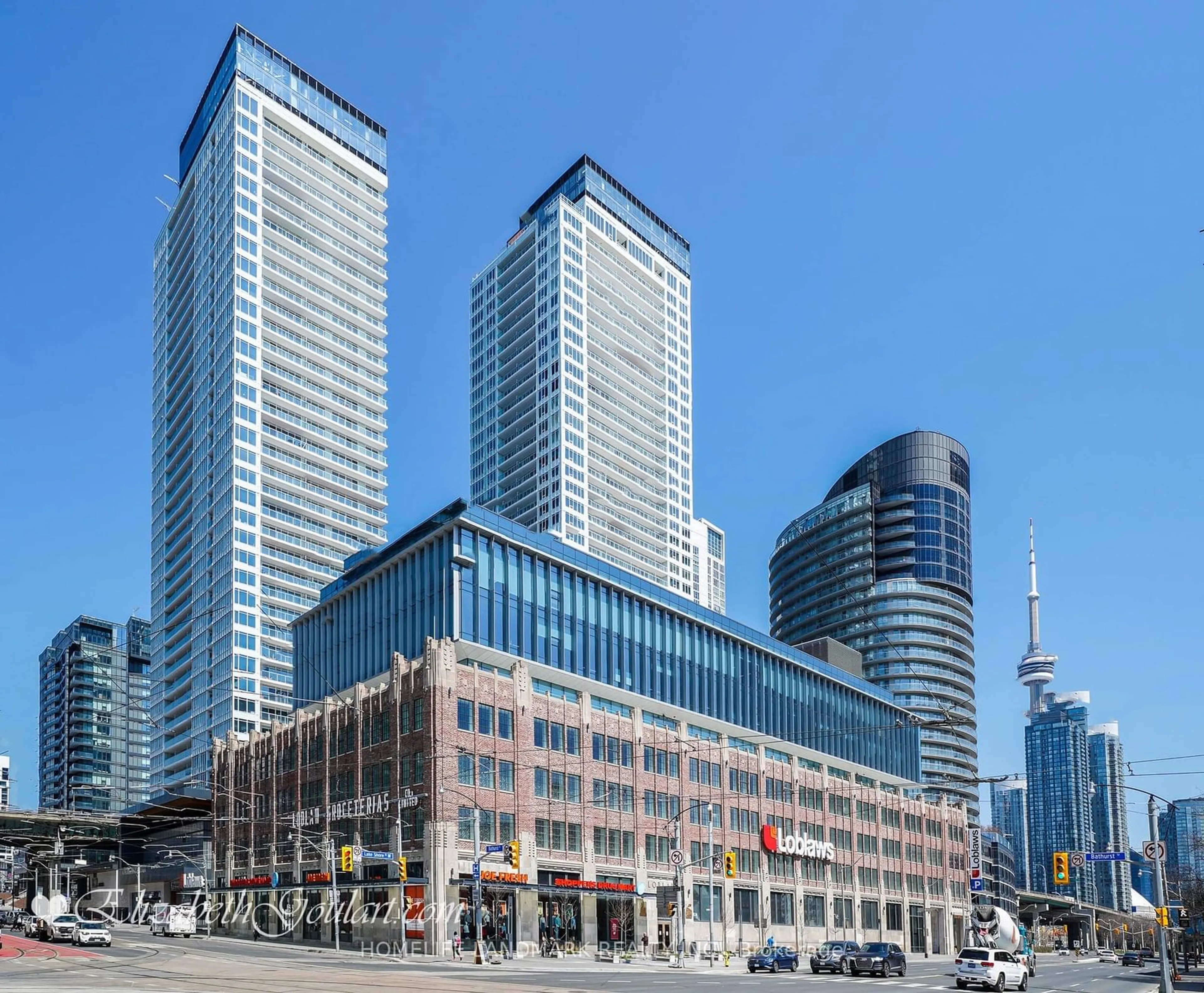 A pic from exterior of the house or condo, the view of city buildings for 19 Bathurst St #18, Toronto Ontario M5V 0M2