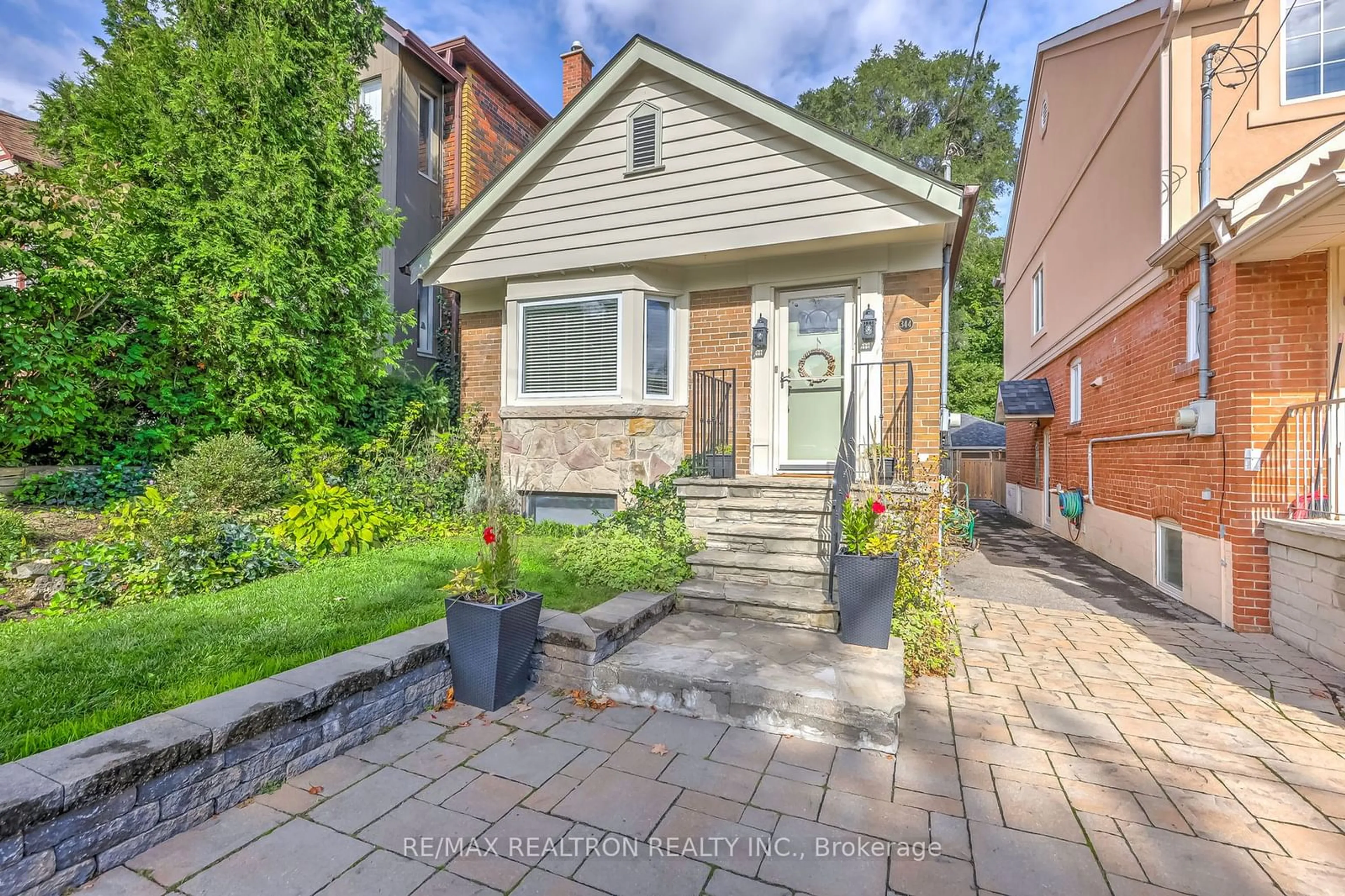 Home with brick exterior material for 344 St Germain Ave, Toronto Ontario M5M 1W5