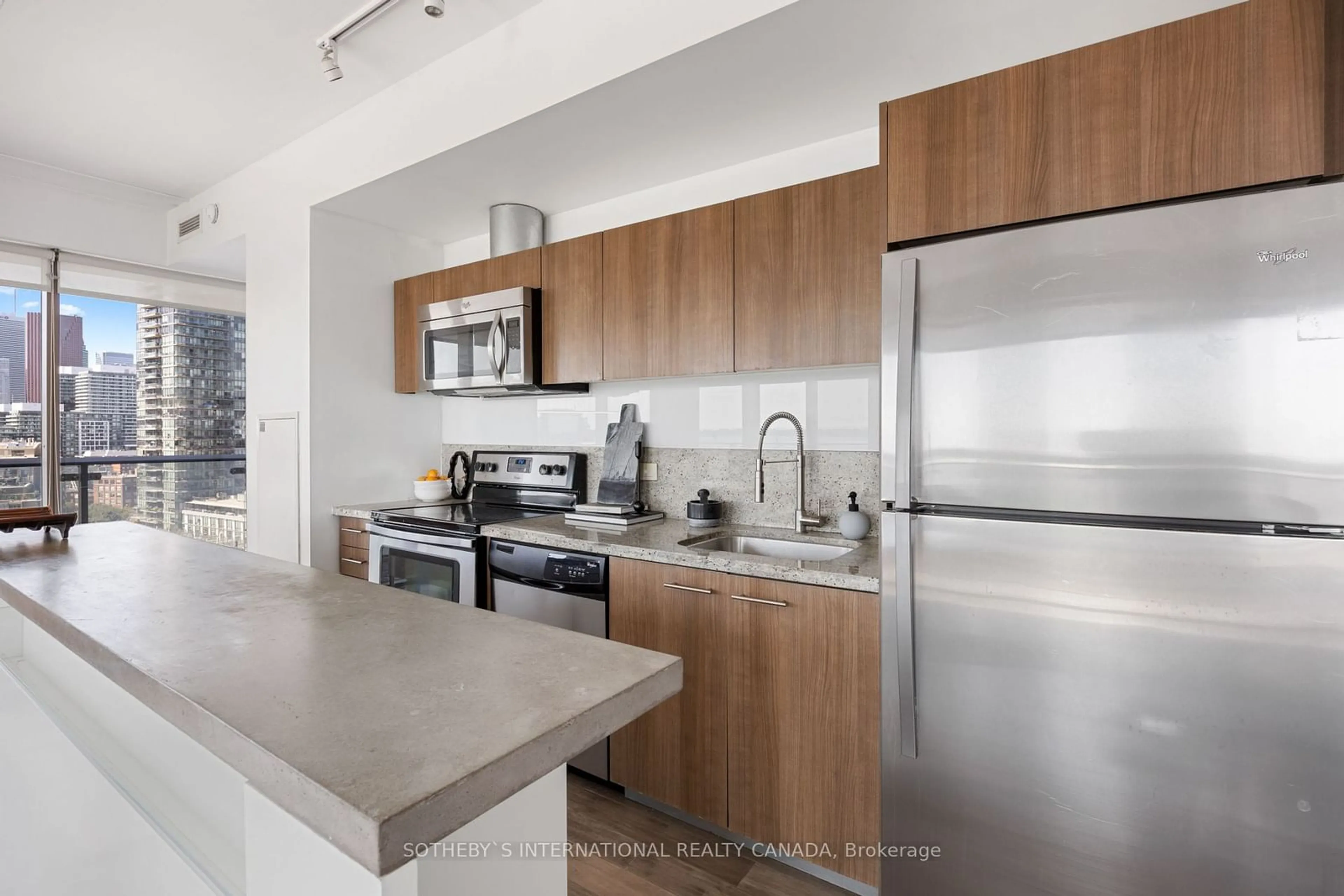 Open concept kitchen for 70 Distillery Lane #1508, Toronto Ontario M5A 0E3