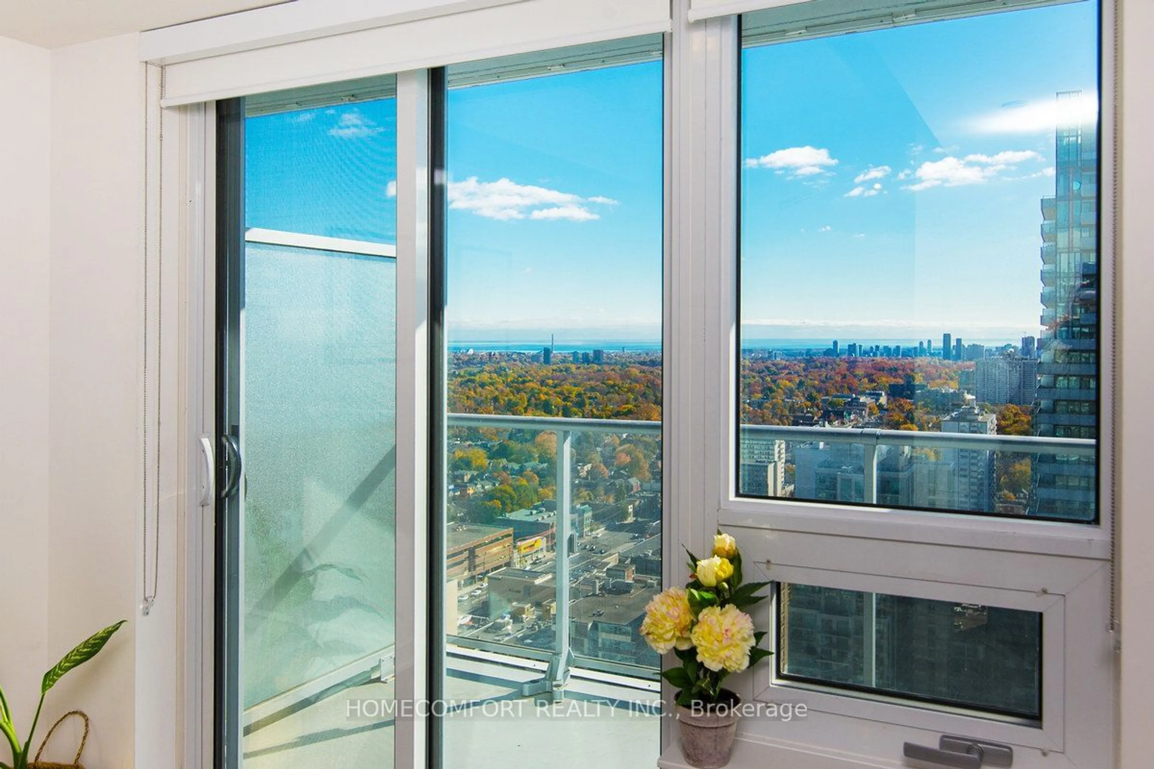 Balcony in the apartment, the view of city buildings for 195 Redpath Ave #3307, Toronto Ontario M4P 0E4