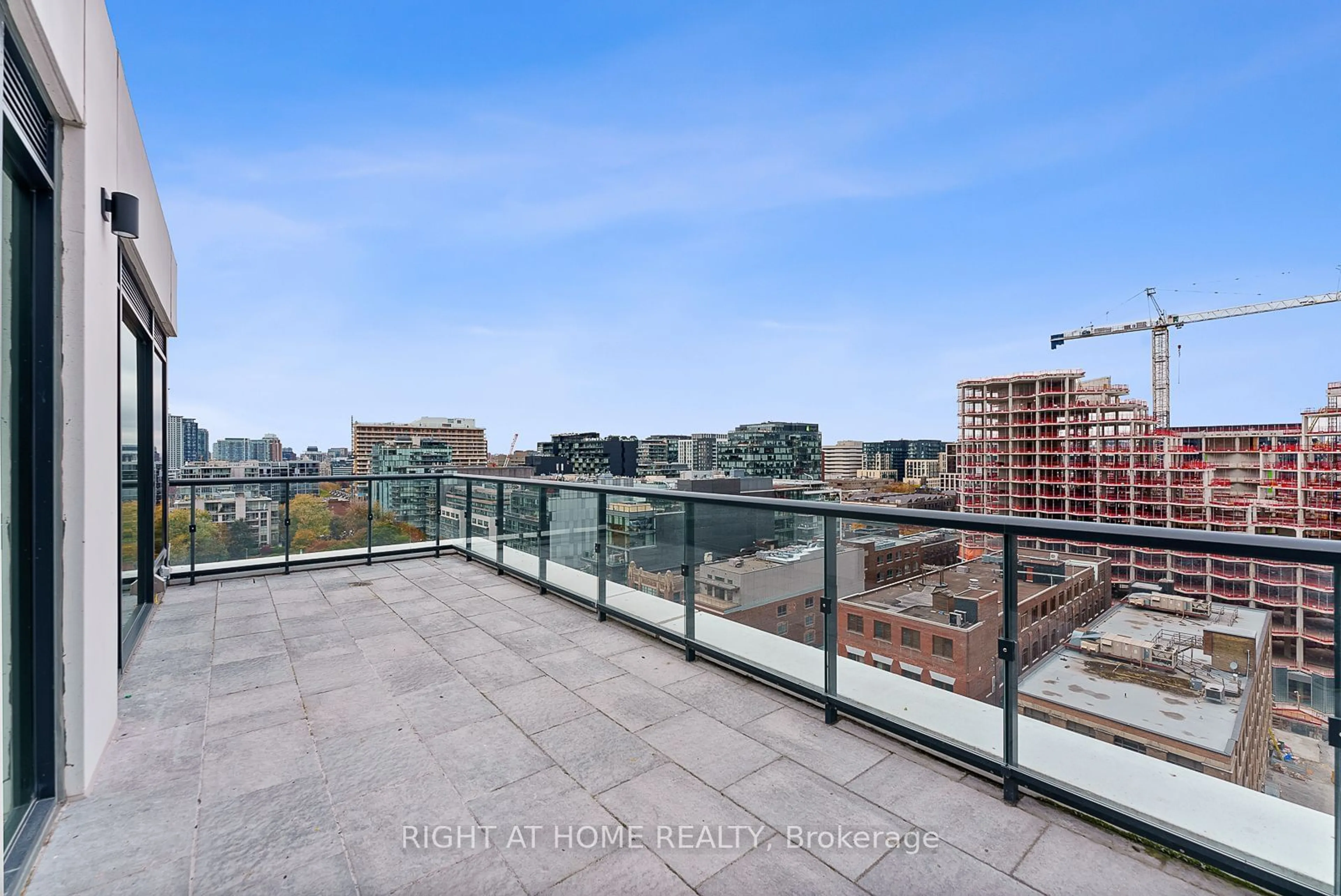 Balcony in the apartment, the view of city buildings for 455 Wellington St #1110, Toronto Ontario M5V 0V8