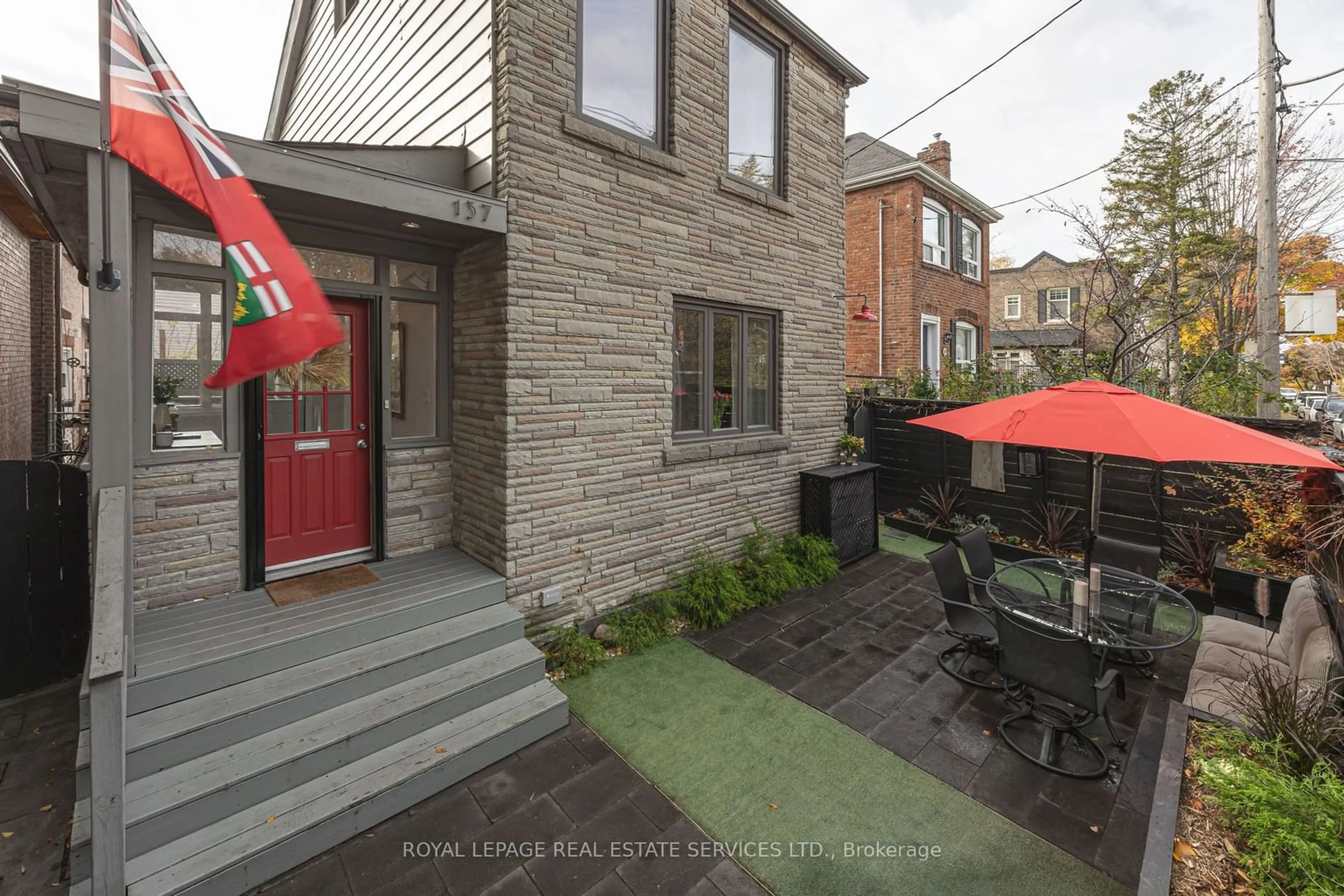 Patio, the fenced backyard for 137 Benson Ave, Toronto Ontario M6G 2J2