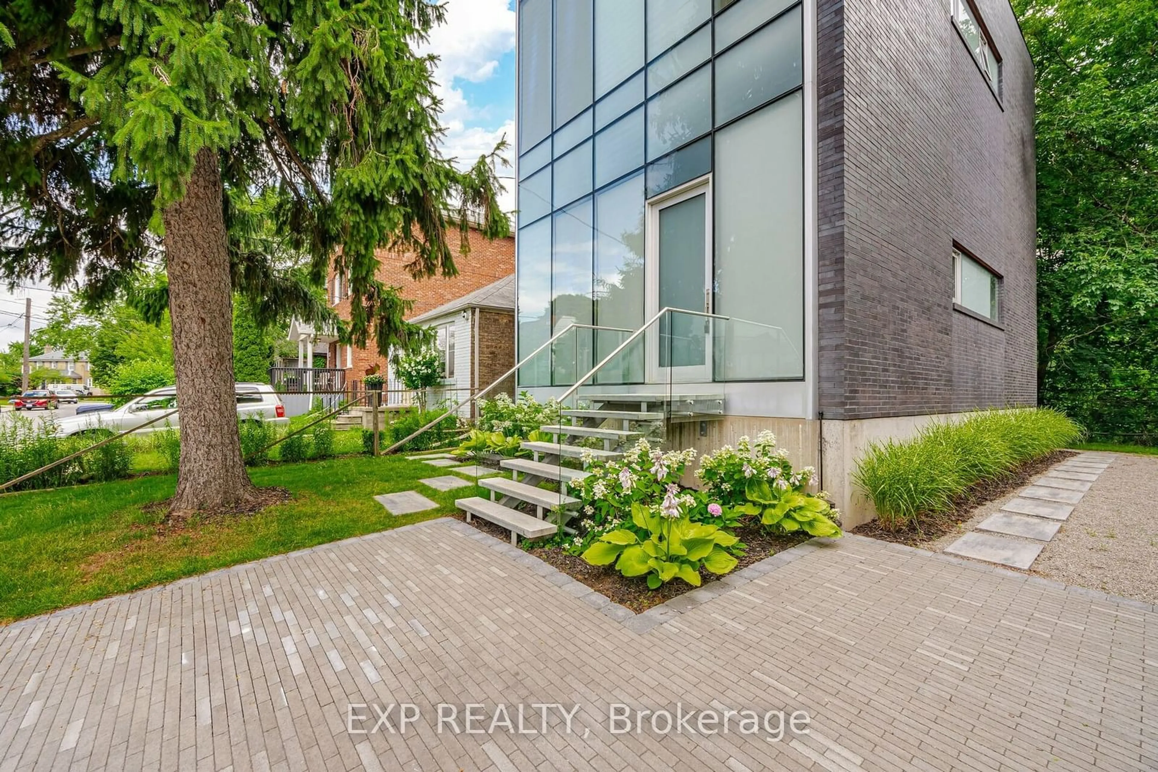 A pic from exterior of the house or condo, the street view for 561 Arlington Ave, Toronto Ontario M6C 3A6