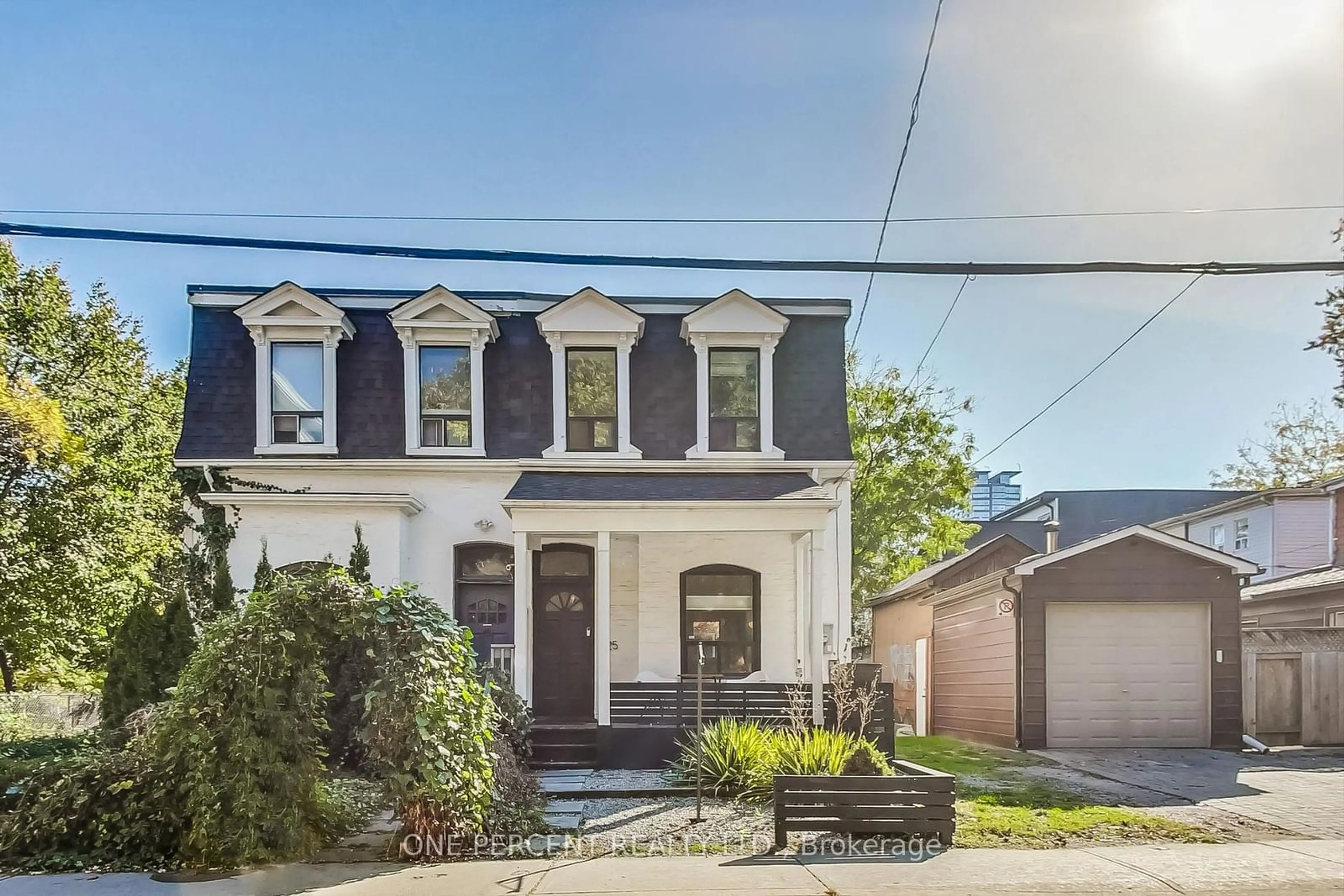 Frontside or backside of a home, the street view for 825 Adelaide St, Toronto Ontario M6J 1B5