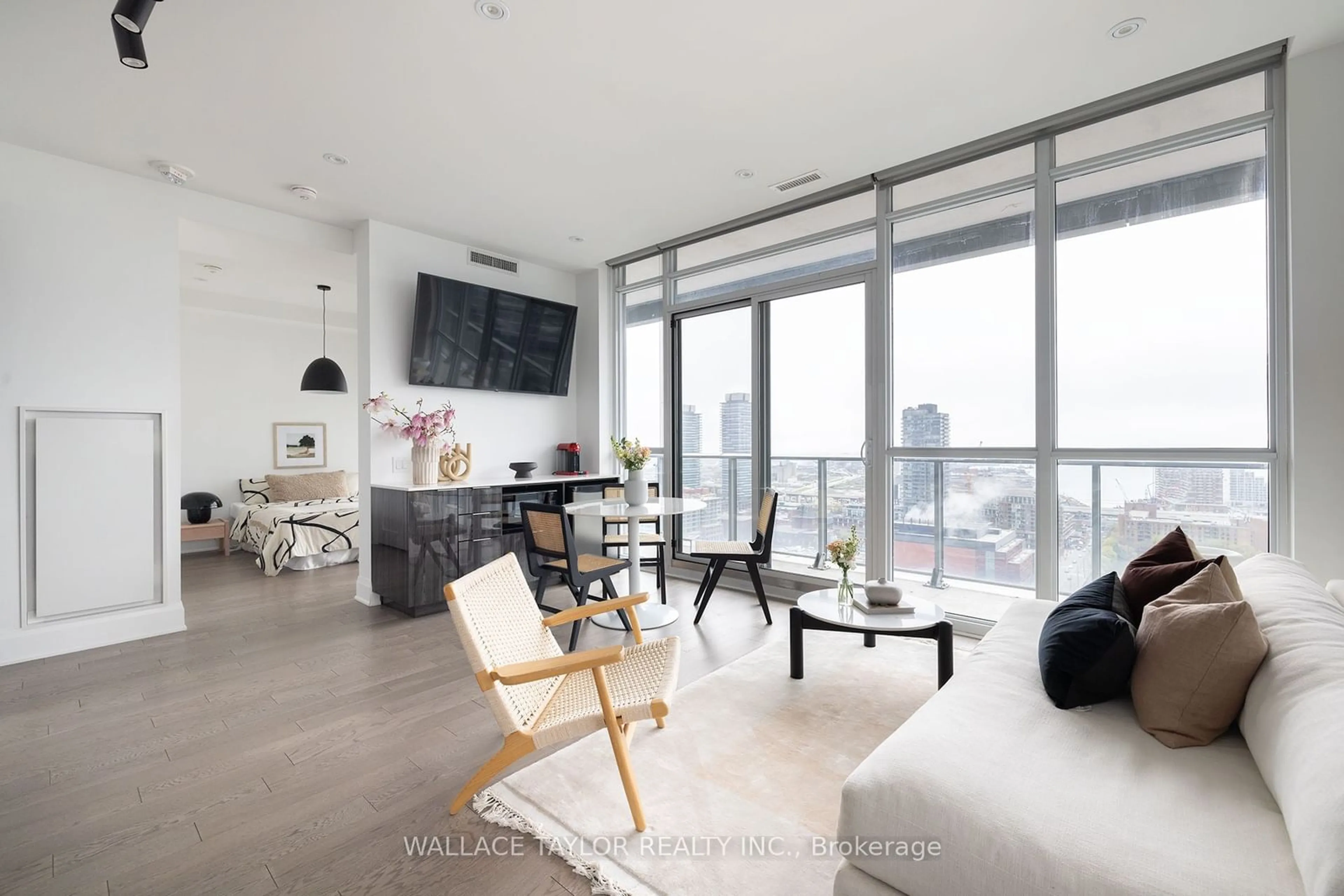 Living room, wood floors for 120 Parliament St #PH 2404, Toronto Ontario M5A 0N6