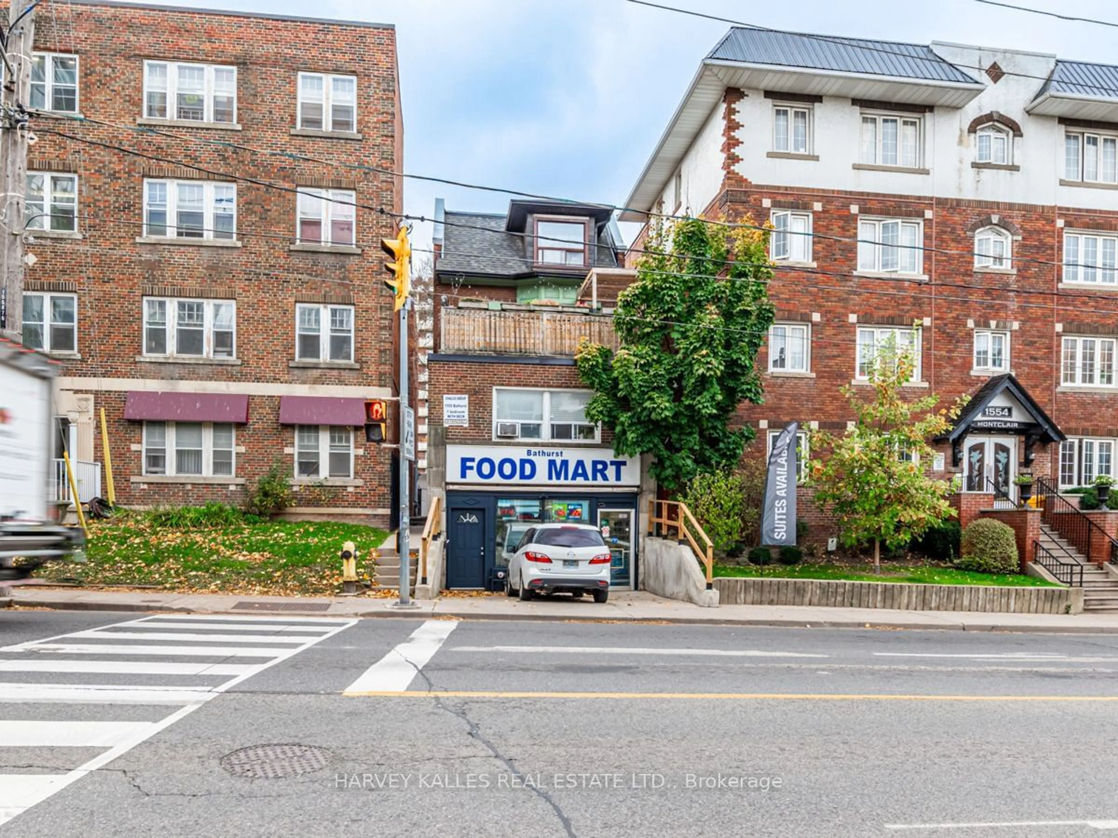 A pic from exterior of the house or condo, the street view for 1552 Bathurst St, Toronto Ontario M5P 3H3