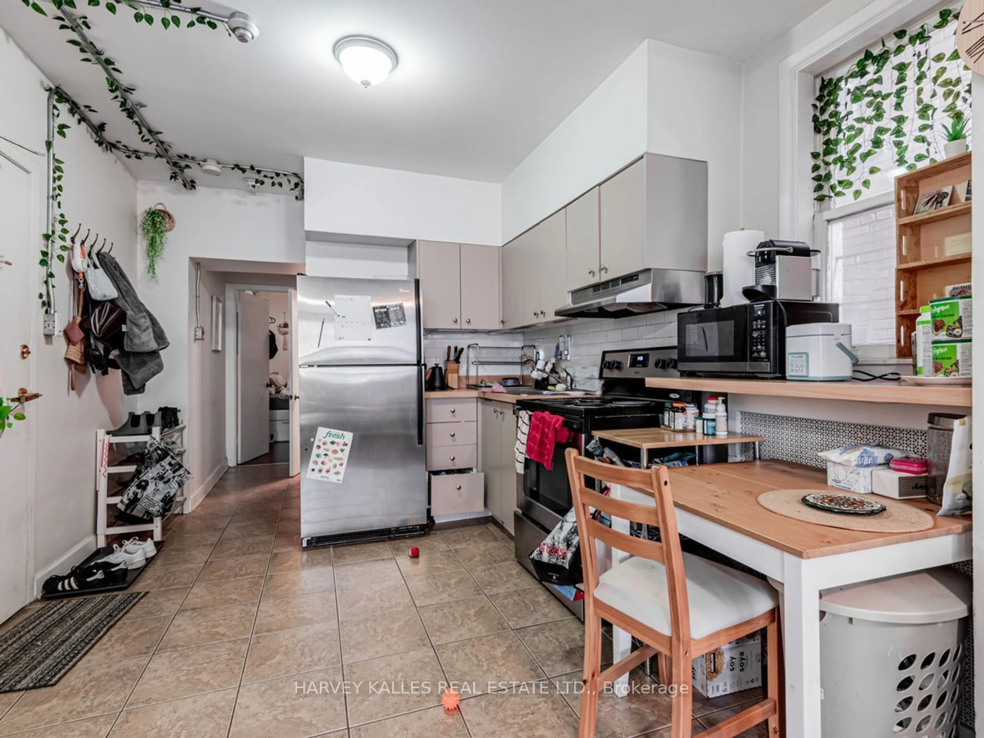 Kitchen, wood floors, the street view for 1552 Bathurst St, Toronto Ontario M5P 3H3