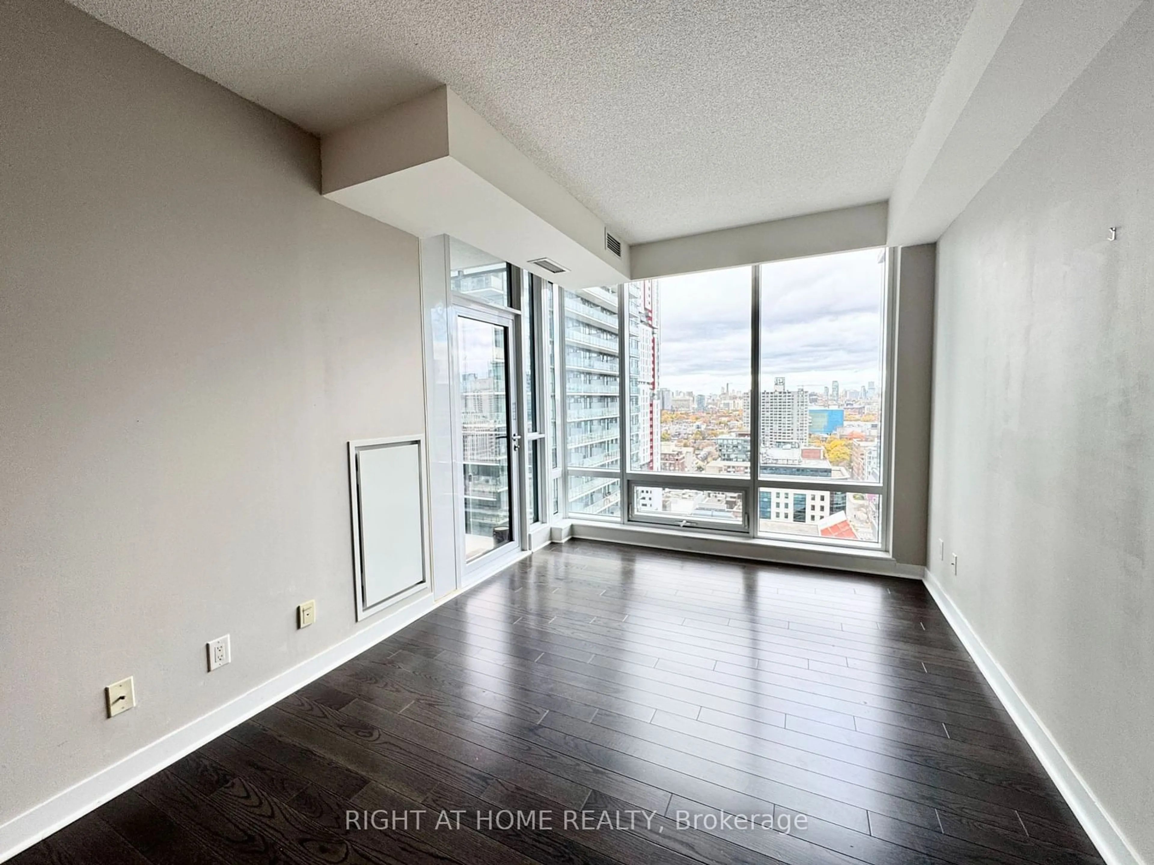 A pic of a room, wood floors for 295 Adelaide St #2303, Toronto Ontario M5V 0L4