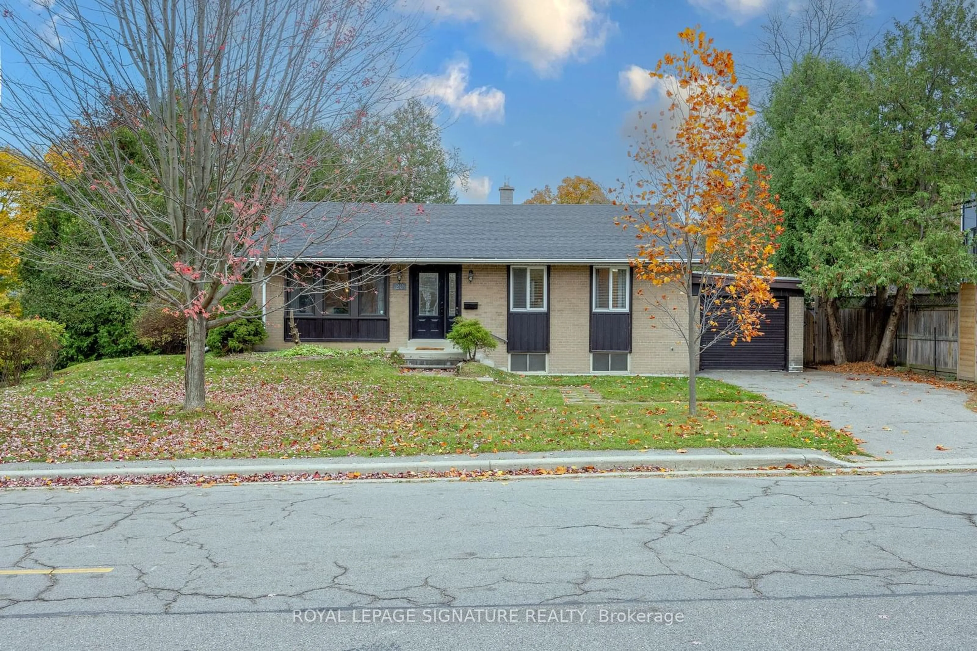 Frontside or backside of a home, the street view for 20 Moccasin Tr, Toronto Ontario M3C 1Y7