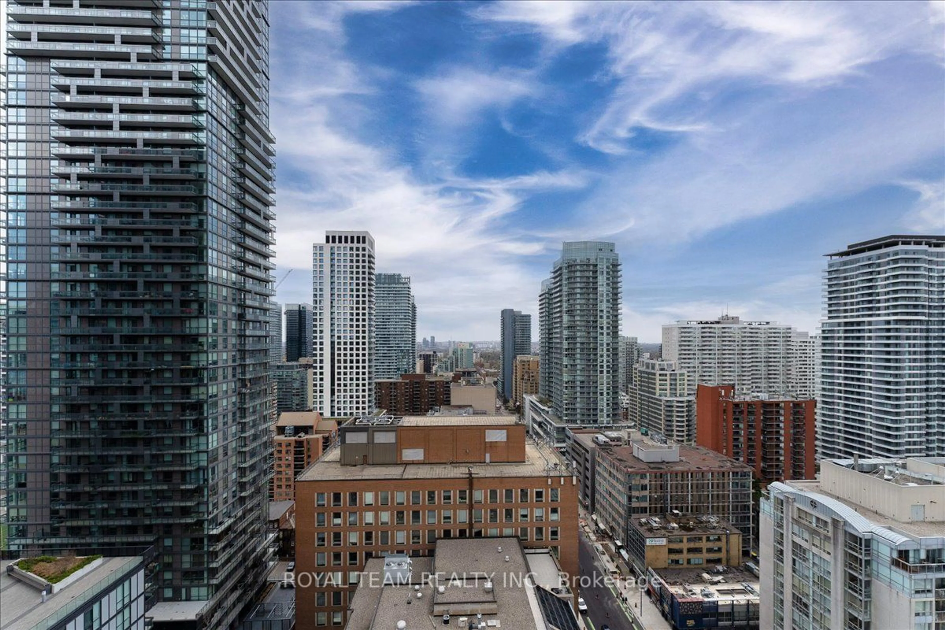 A pic from exterior of the house or condo, the view of city buildings for 8 Eglinton Ave #1910, Toronto Ontario M4P 0C1