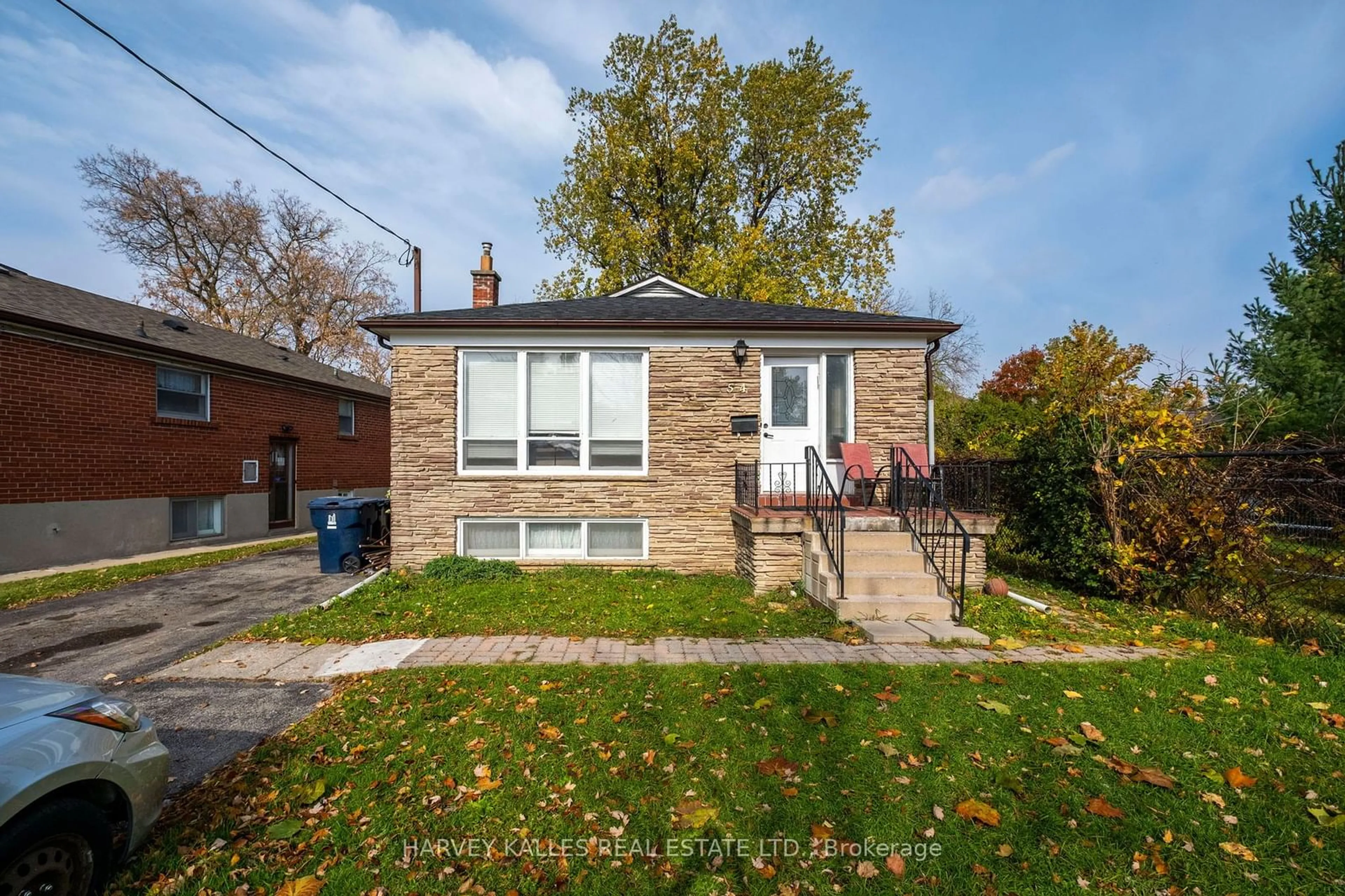 Frontside or backside of a home, the fenced backyard for 54 Clanton Park Rd, Toronto Ontario M3H 2C8