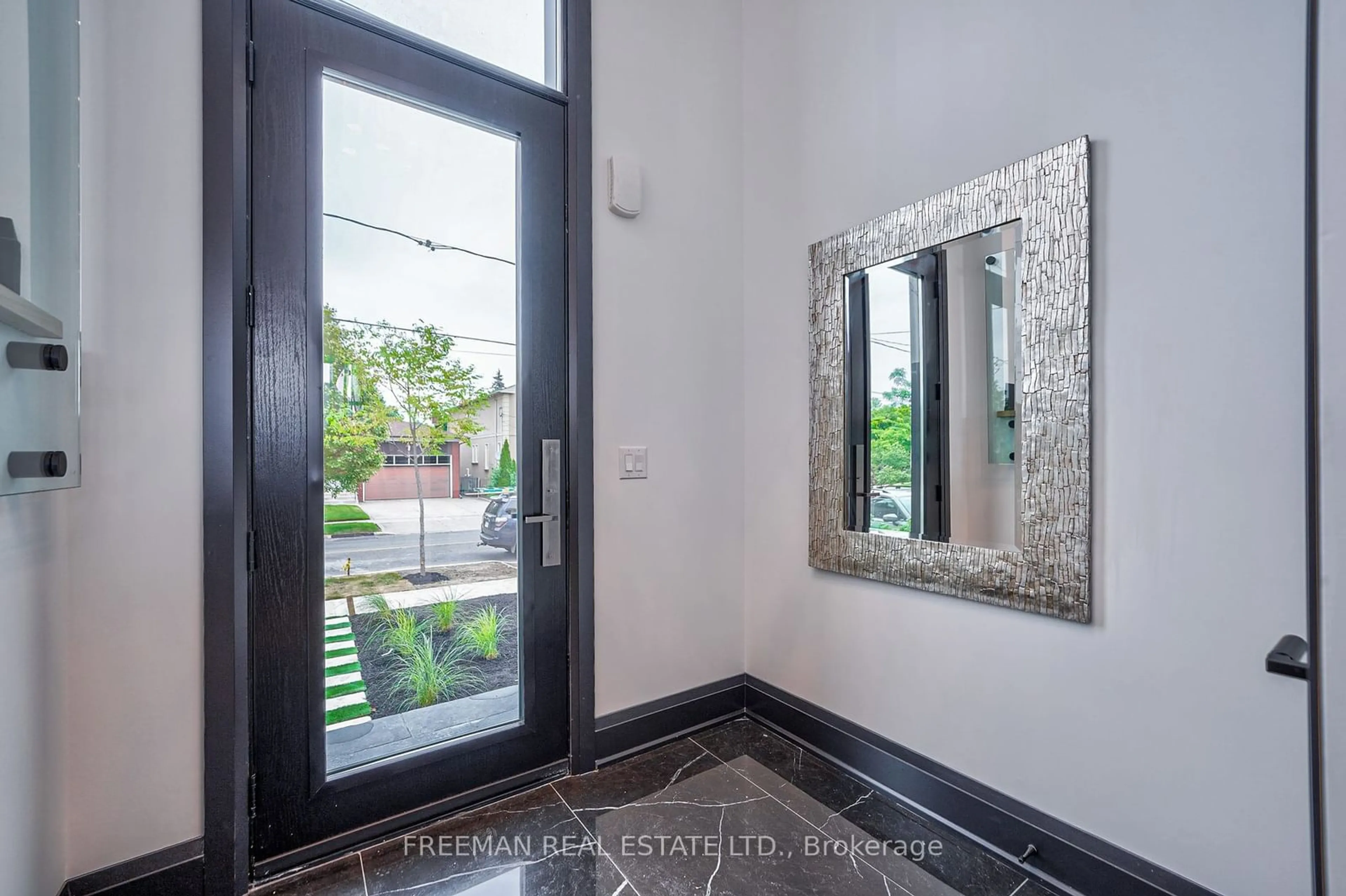 Indoor entryway, wood floors for 683 Glencairn Ave, Toronto Ontario M6B 1Z8