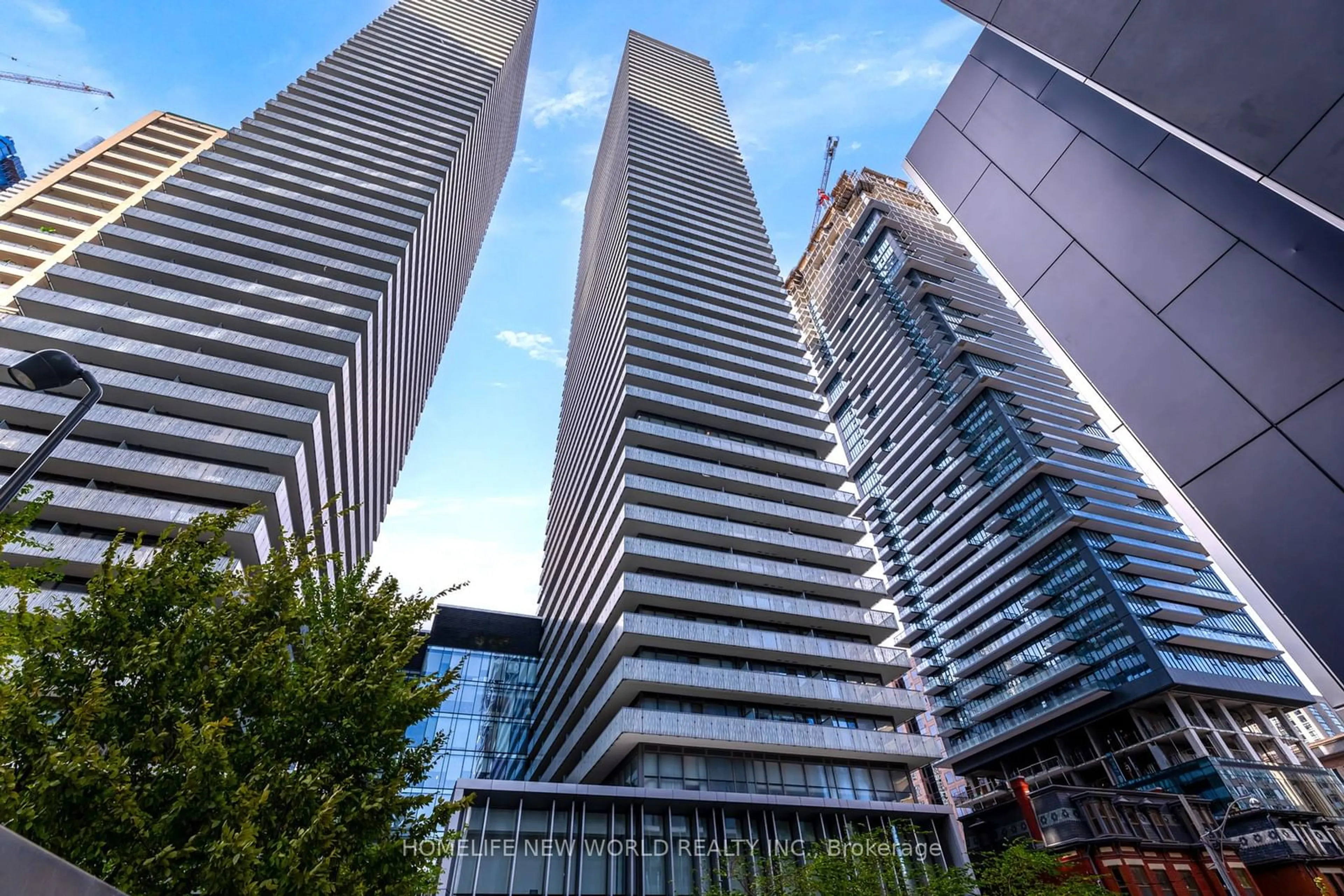 A pic from exterior of the house or condo, the view of city buildings for 50 Charles St #4409, Toronto Ontario M4Y 0C3