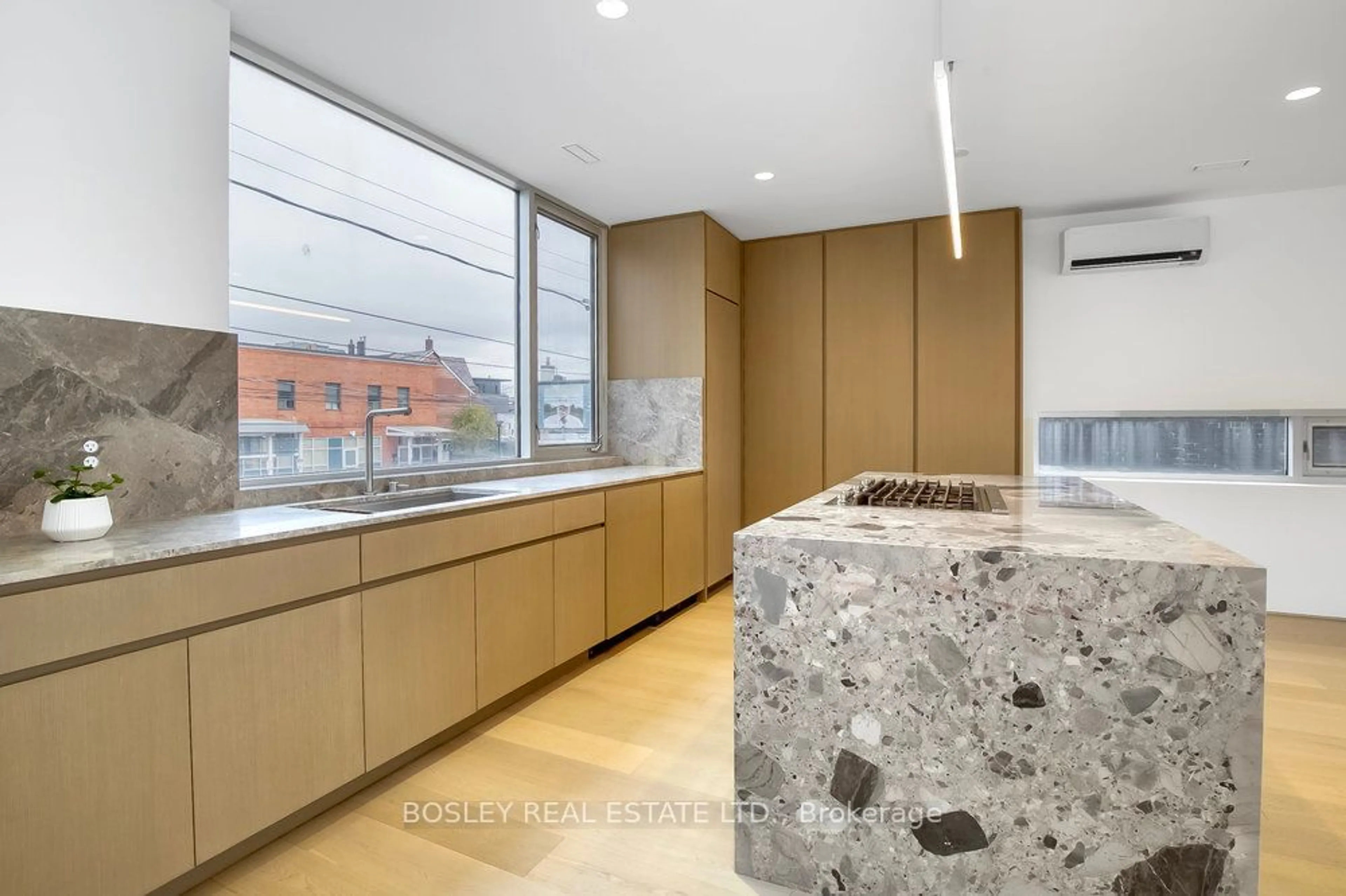 Contemporary kitchen, cement floor for 899 Dundas St, Toronto Ontario M6J 1V9