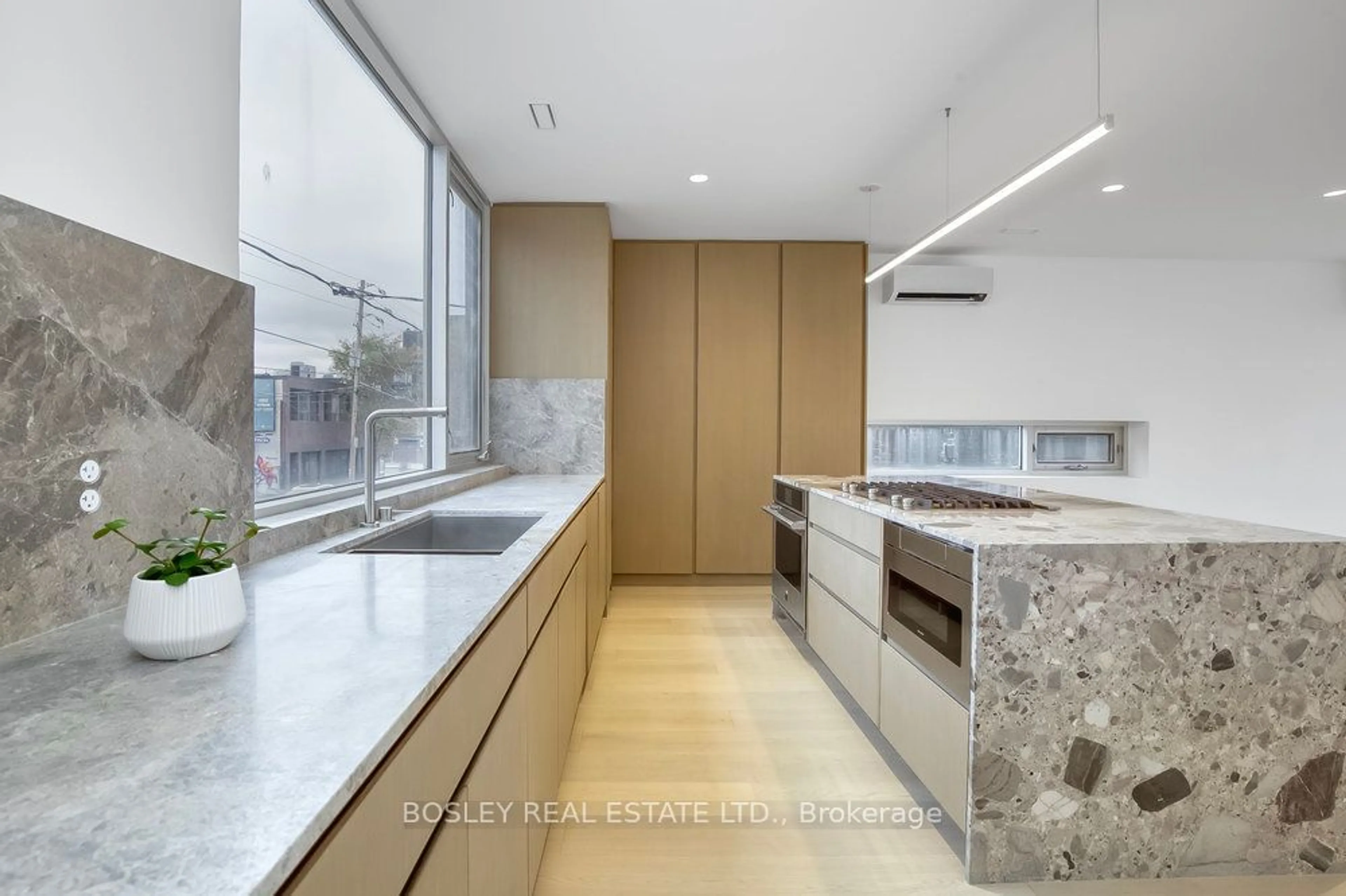 Contemporary kitchen, cement floor for 899 Dundas St, Toronto Ontario M6J 1V9